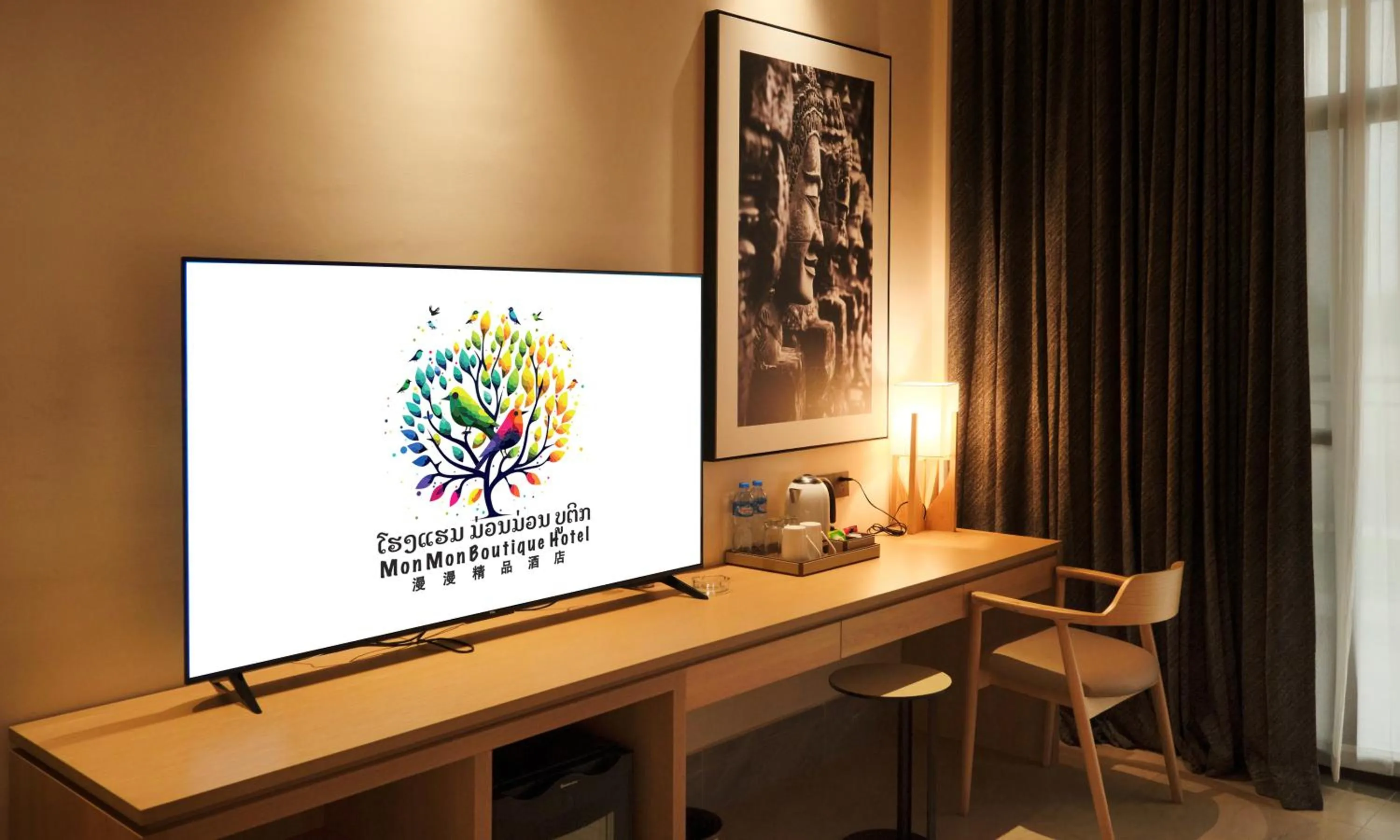 Communal lounge/ TV room in MonMonBoutique Hotel