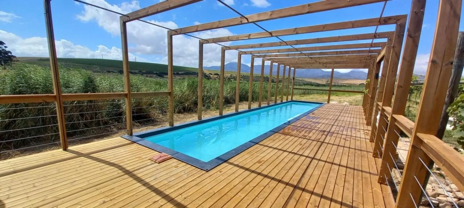 Swimming pool in Endless Vineyards at Wildekrans Wine Estate