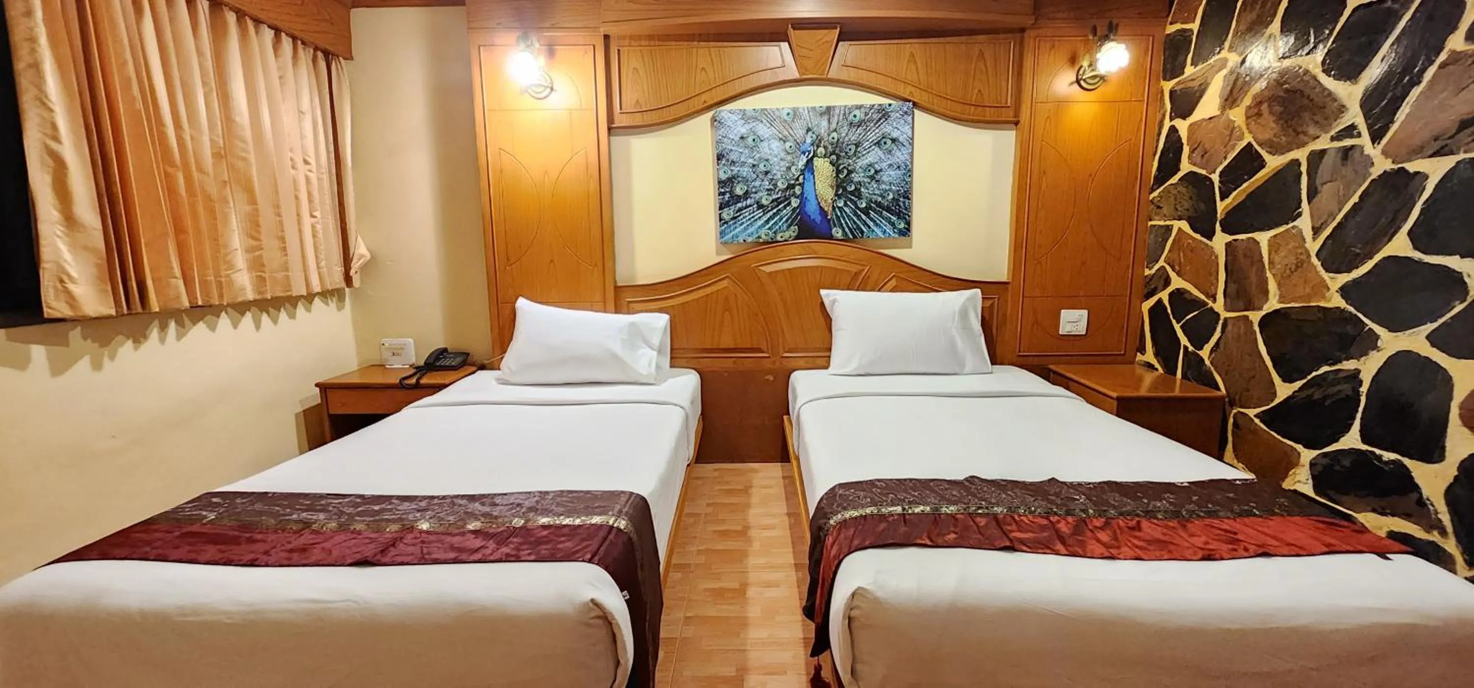 Bed in Tiger Complex Hotel