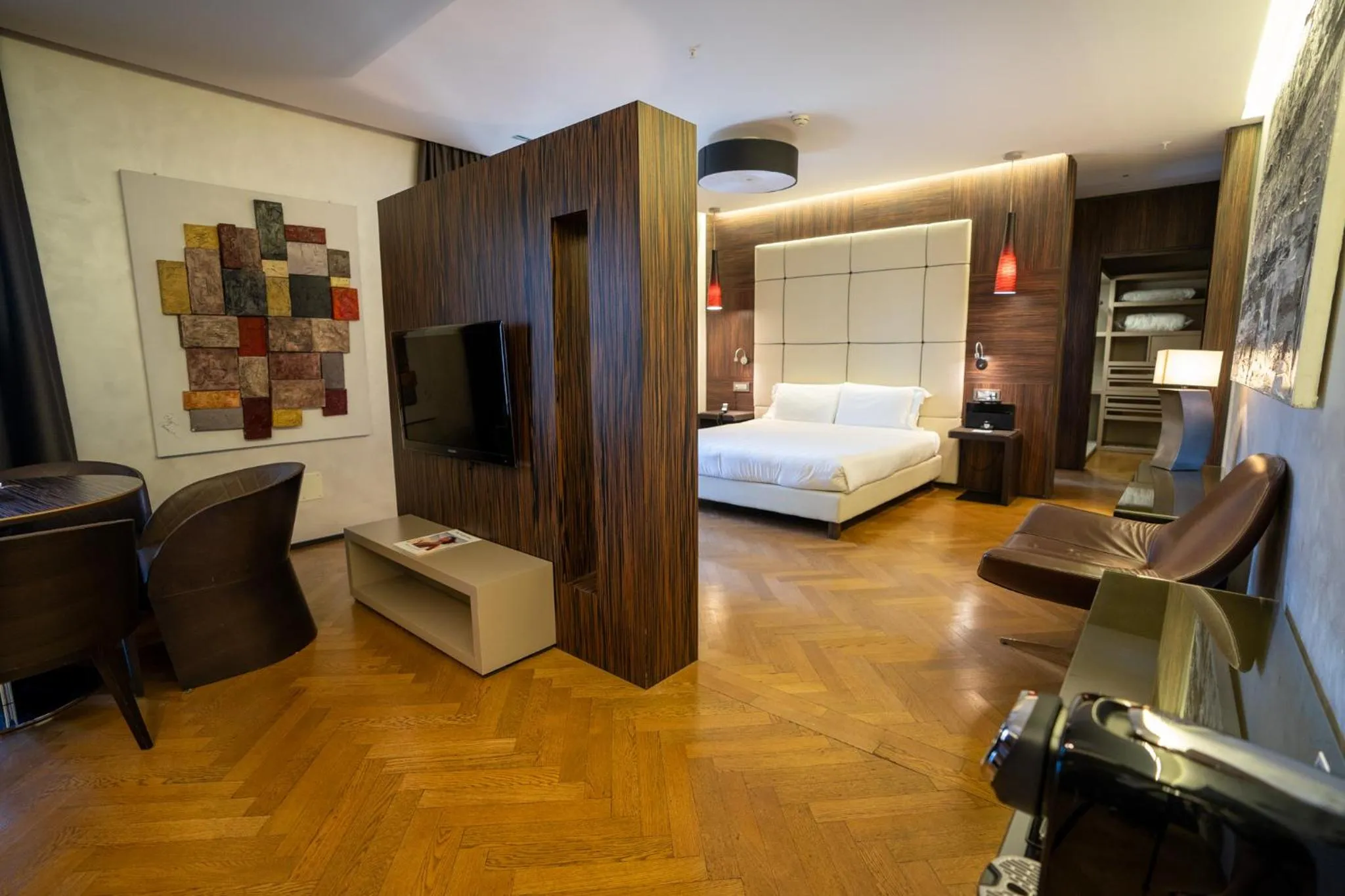 Bed in Divina Luxury Hotel