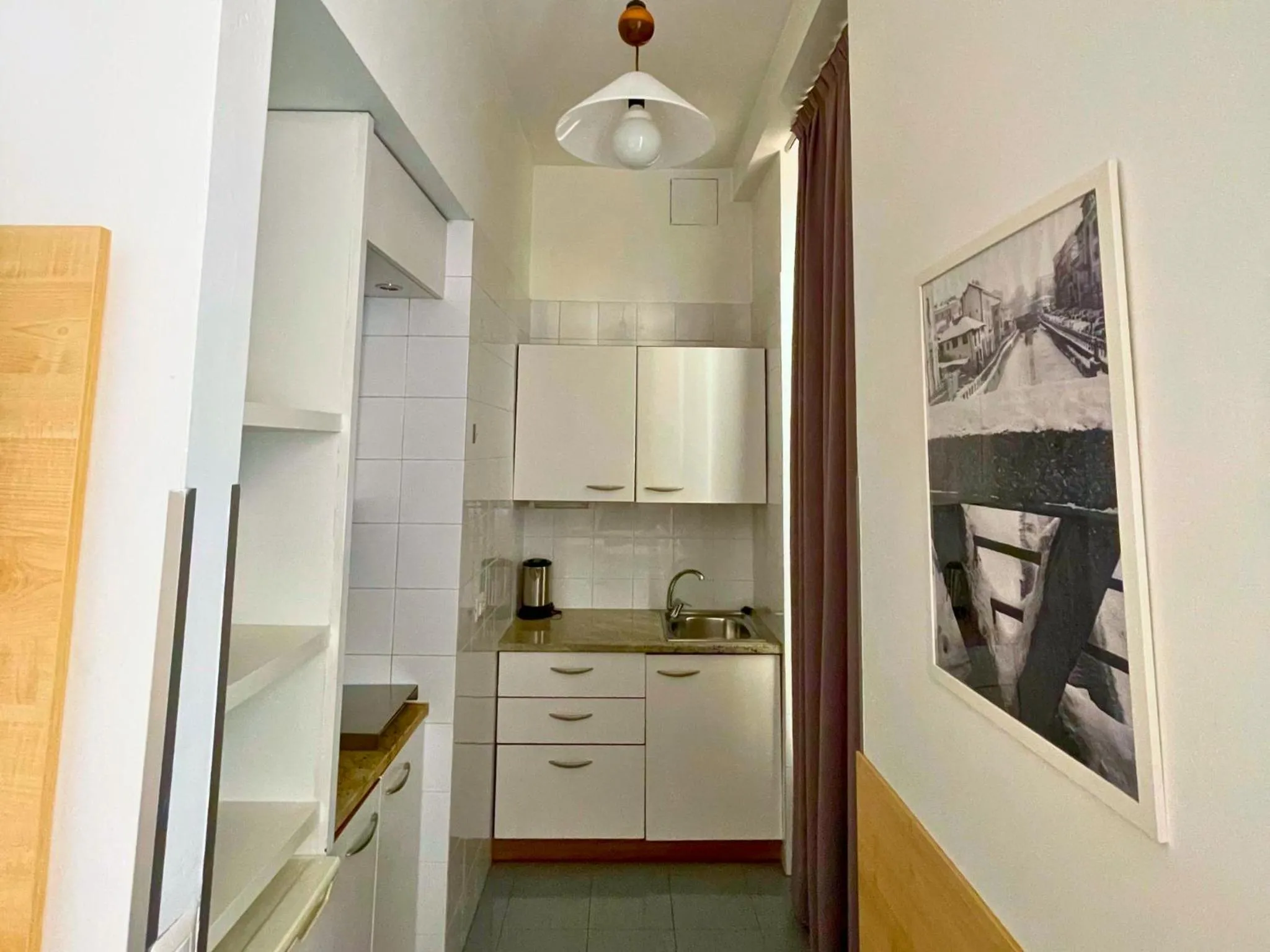 Kitchen or kitchenette in Navigli Suites