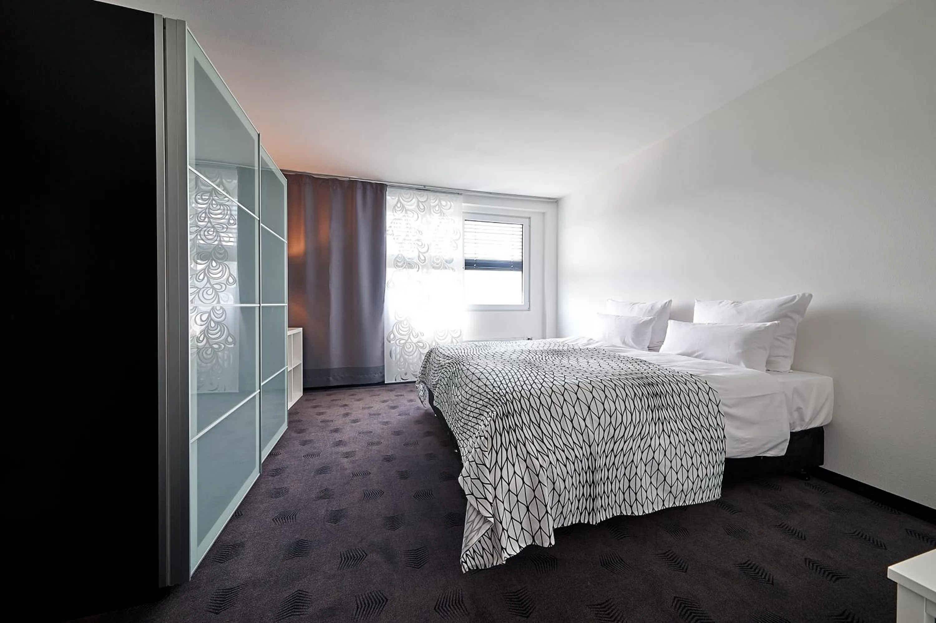 Photo of the whole room, Bed in FourSide Plaza Hotel Trier, Trademark Collection by Wyndham