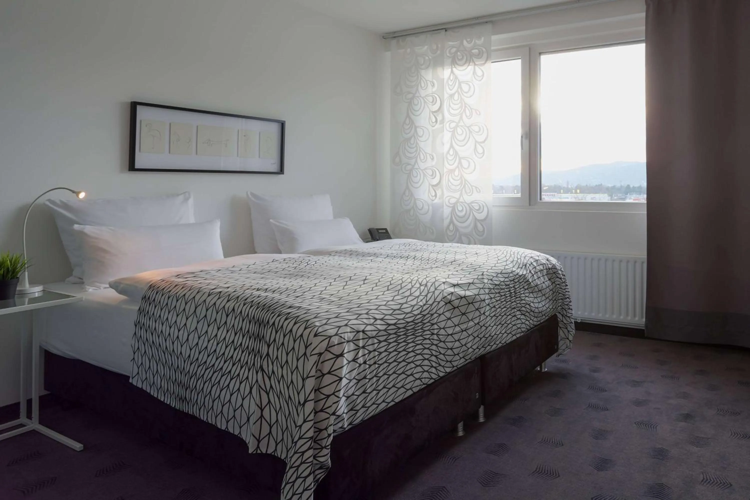 Photo of the whole room, Bed in FourSide Plaza Hotel Trier, Trademark Collection by Wyndham