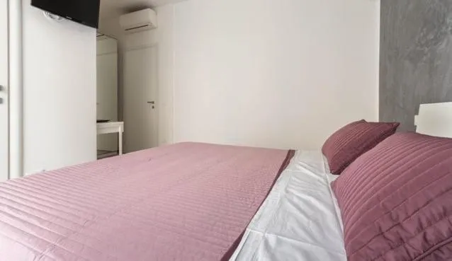 Bed in Guest House Roma