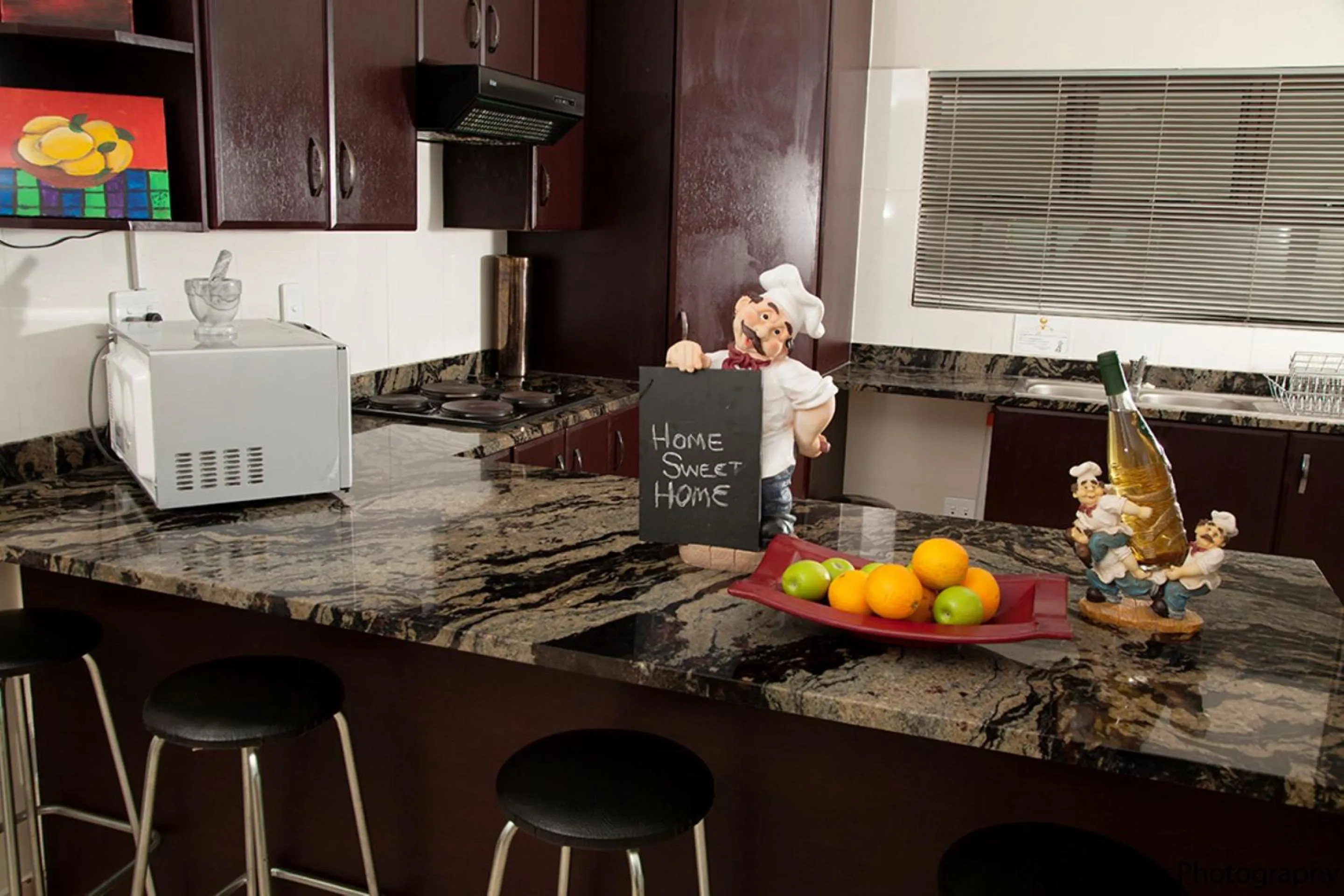 kitchen in Palm Valley Inn And Day Spa