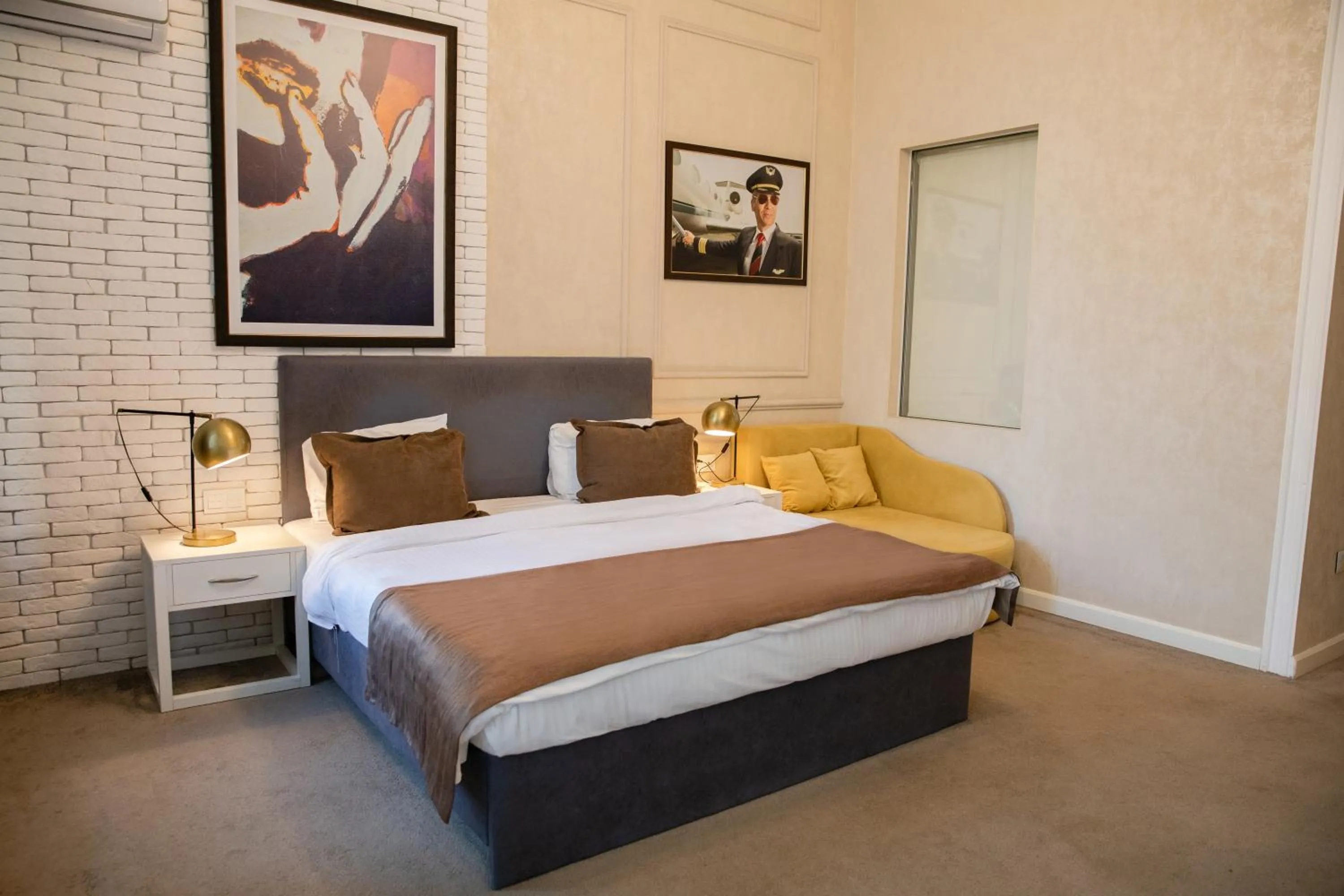 Bed in Zimmer Boutique Hotel