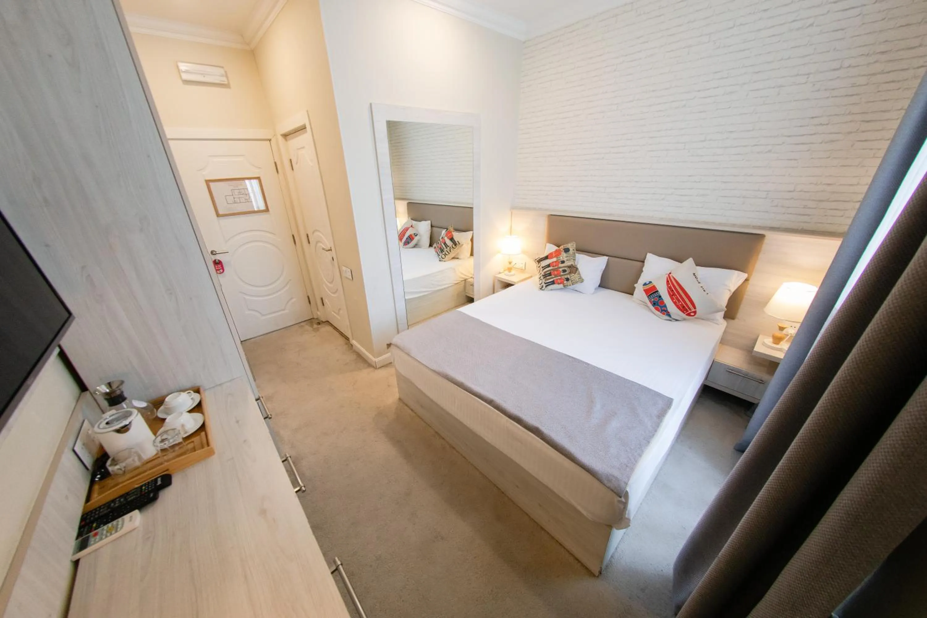 Bed in Zimmer Boutique Hotel