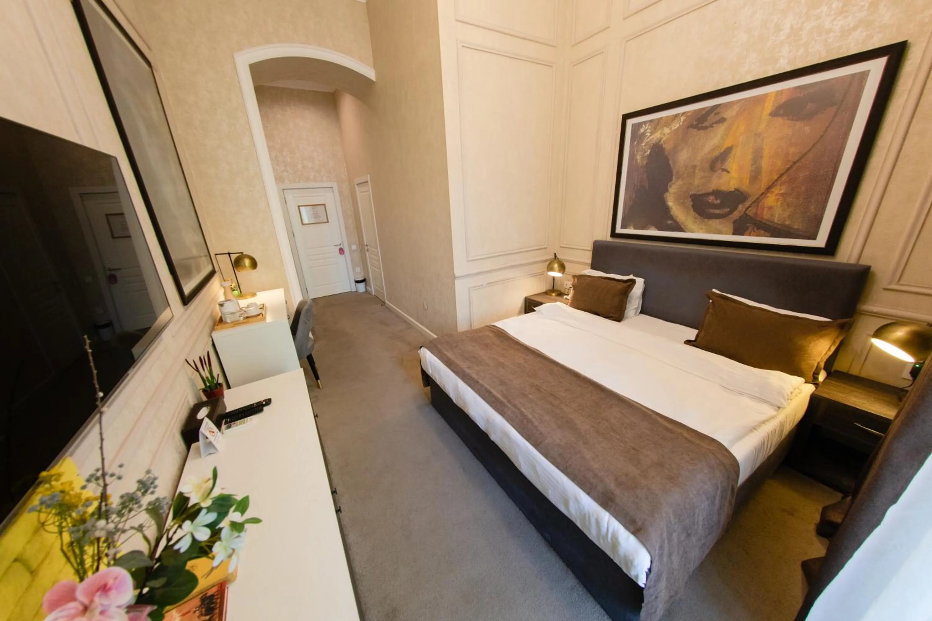 Bed in Zimmer Boutique Hotel