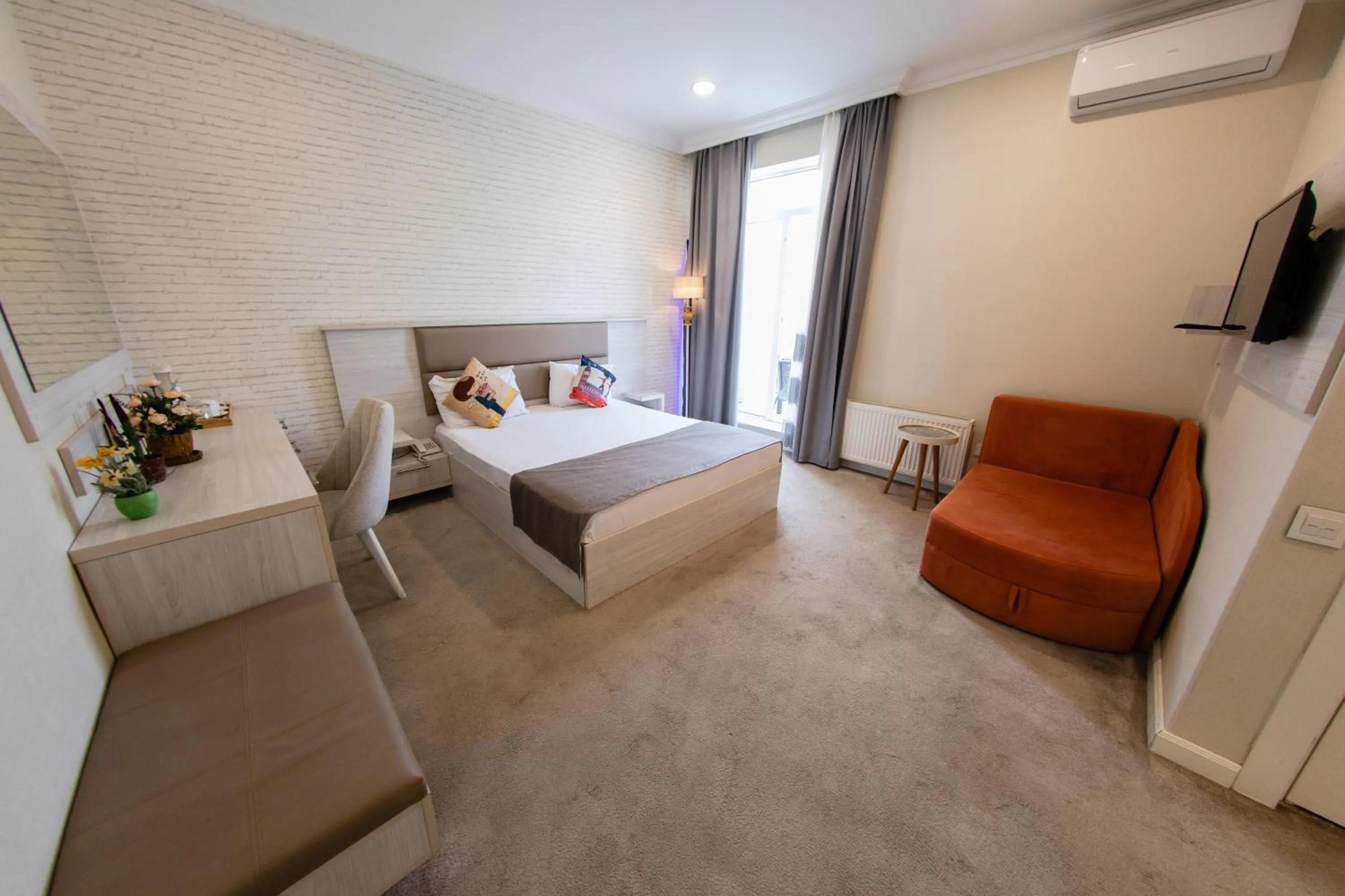 Bed in Zimmer Boutique Hotel