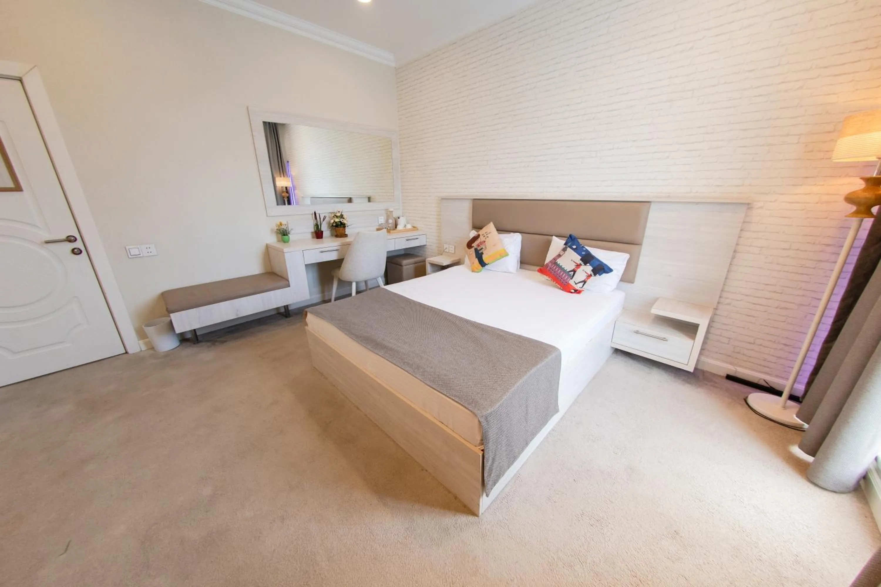 Bed in Zimmer Boutique Hotel