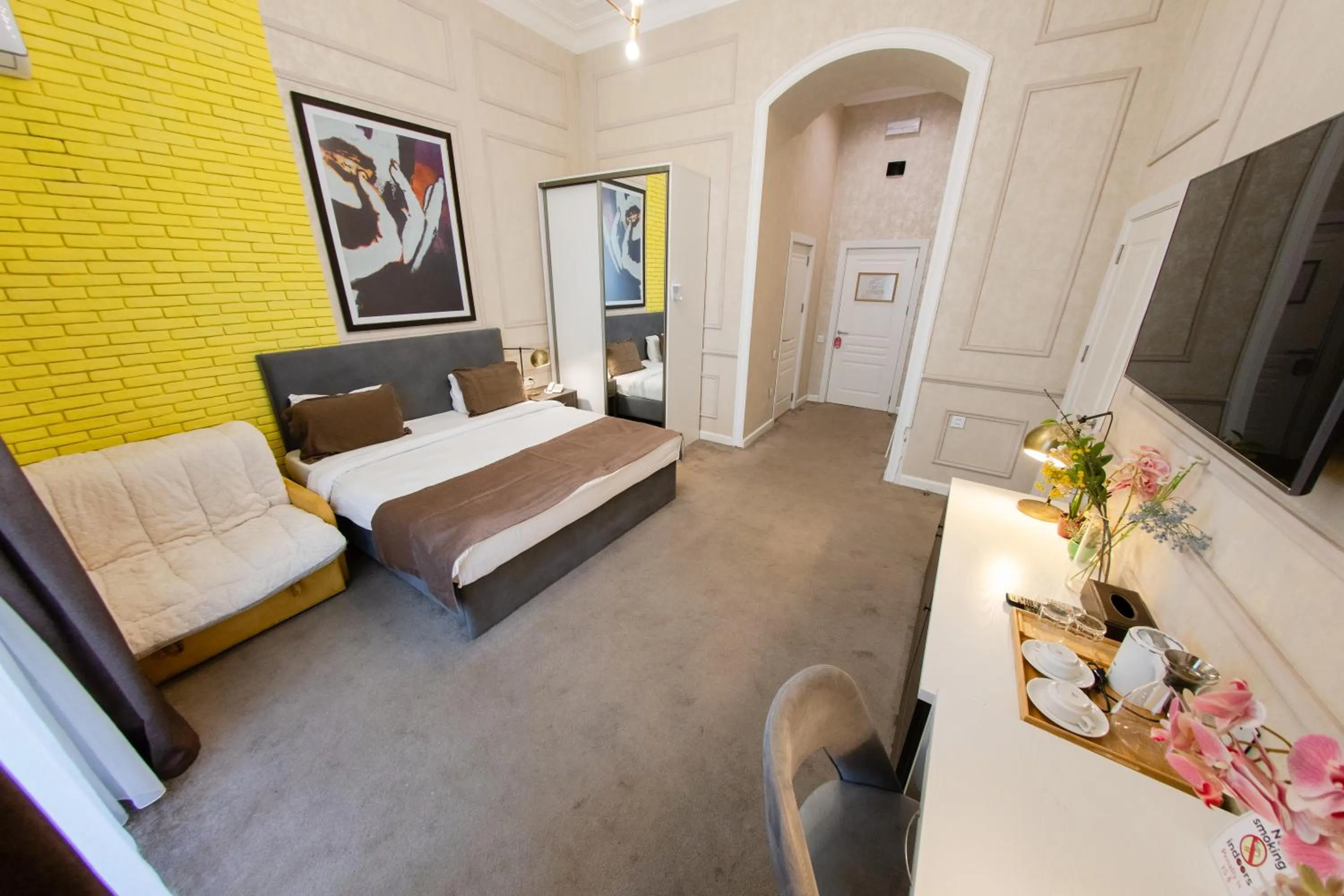 Bed in Zimmer Boutique Hotel