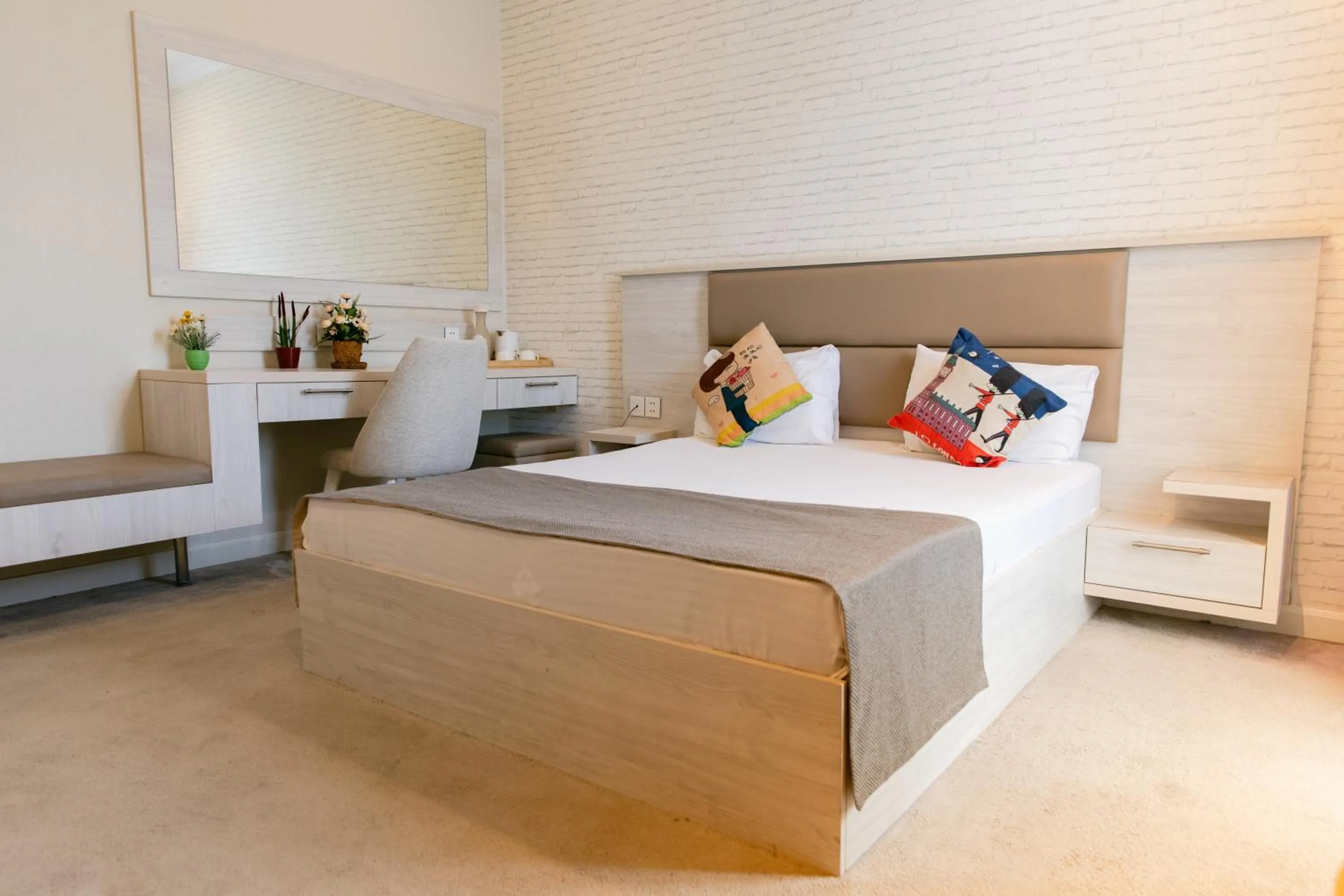 Bed in Zimmer Boutique Hotel