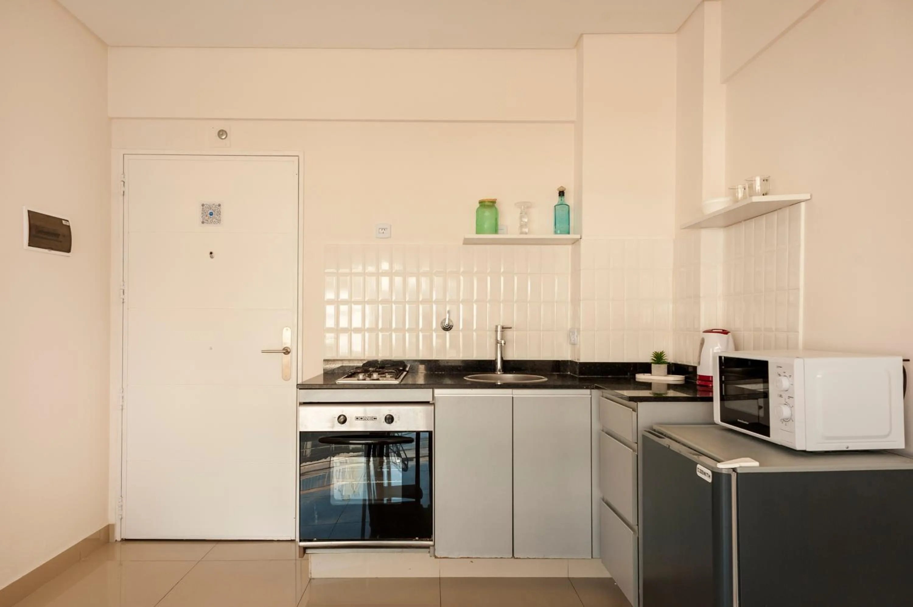 Kitchen or kitchenette in Báltico Suites