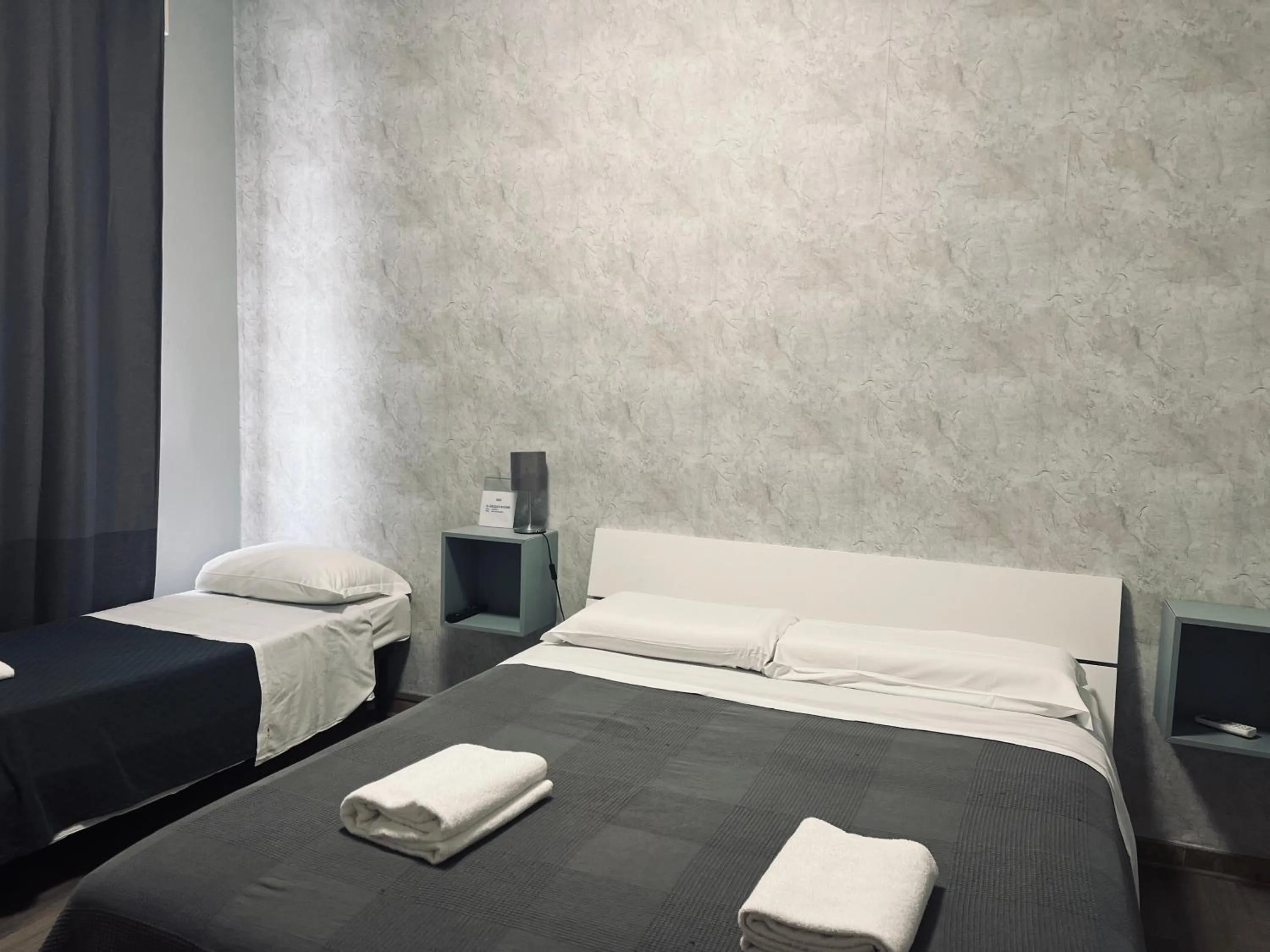 Bed in Il Galileo Rooms