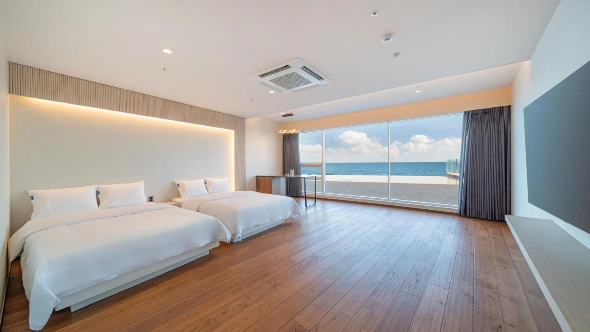 Bed in Sharp & Flat Hotel