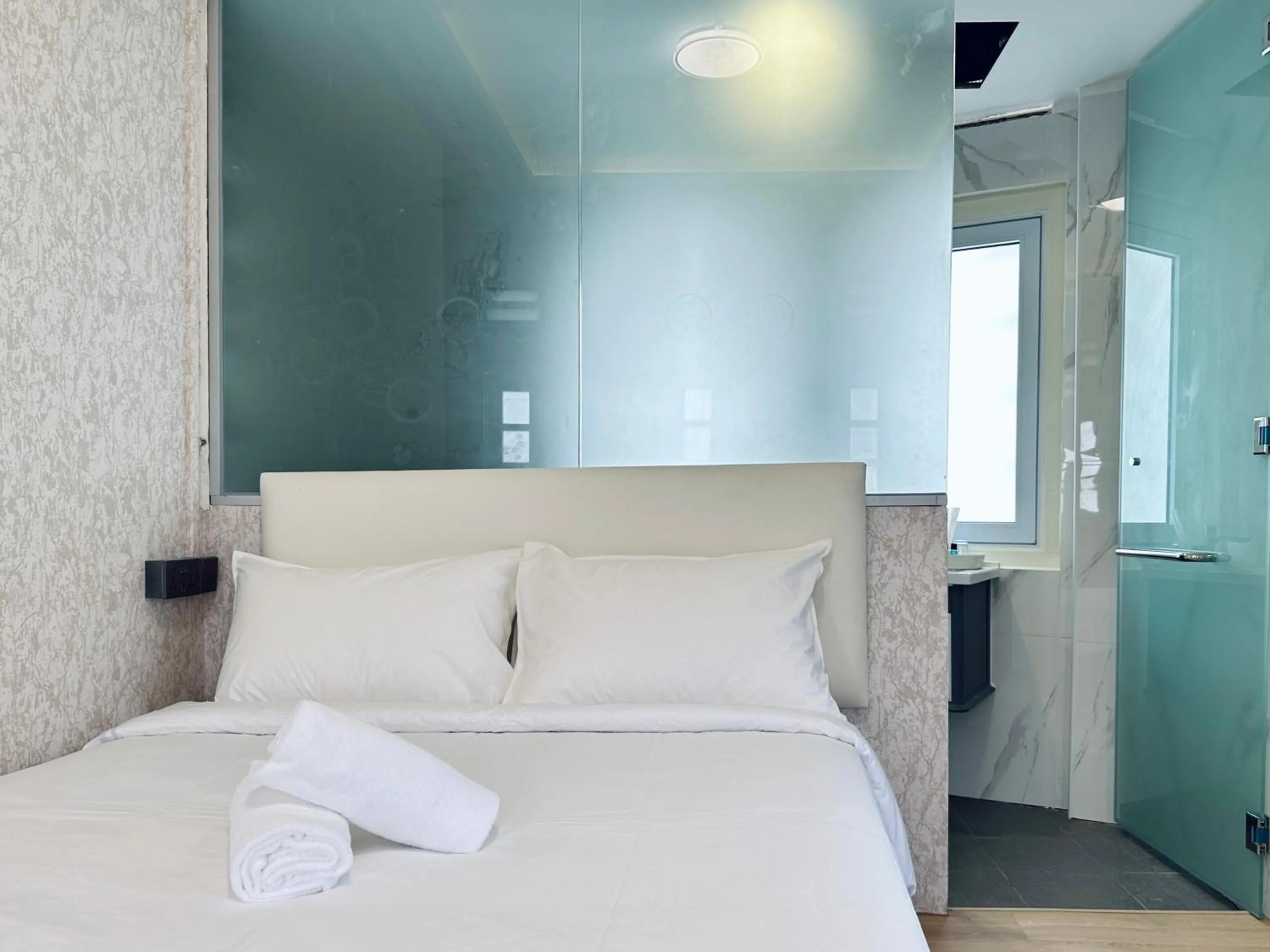 Bed in Kam Leng Hotel