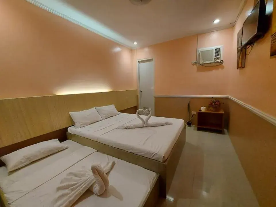 Deluxe Triple Room in New Village Lodge Deluxe Triple Room in New Village Lodge