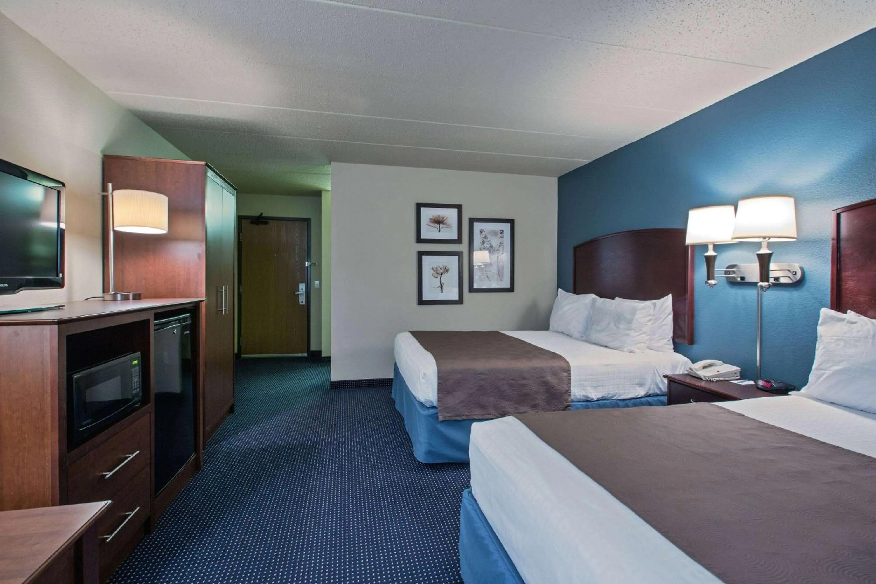 Photo of the whole room, Bed in AmericInn by Wyndham Fort Dodge