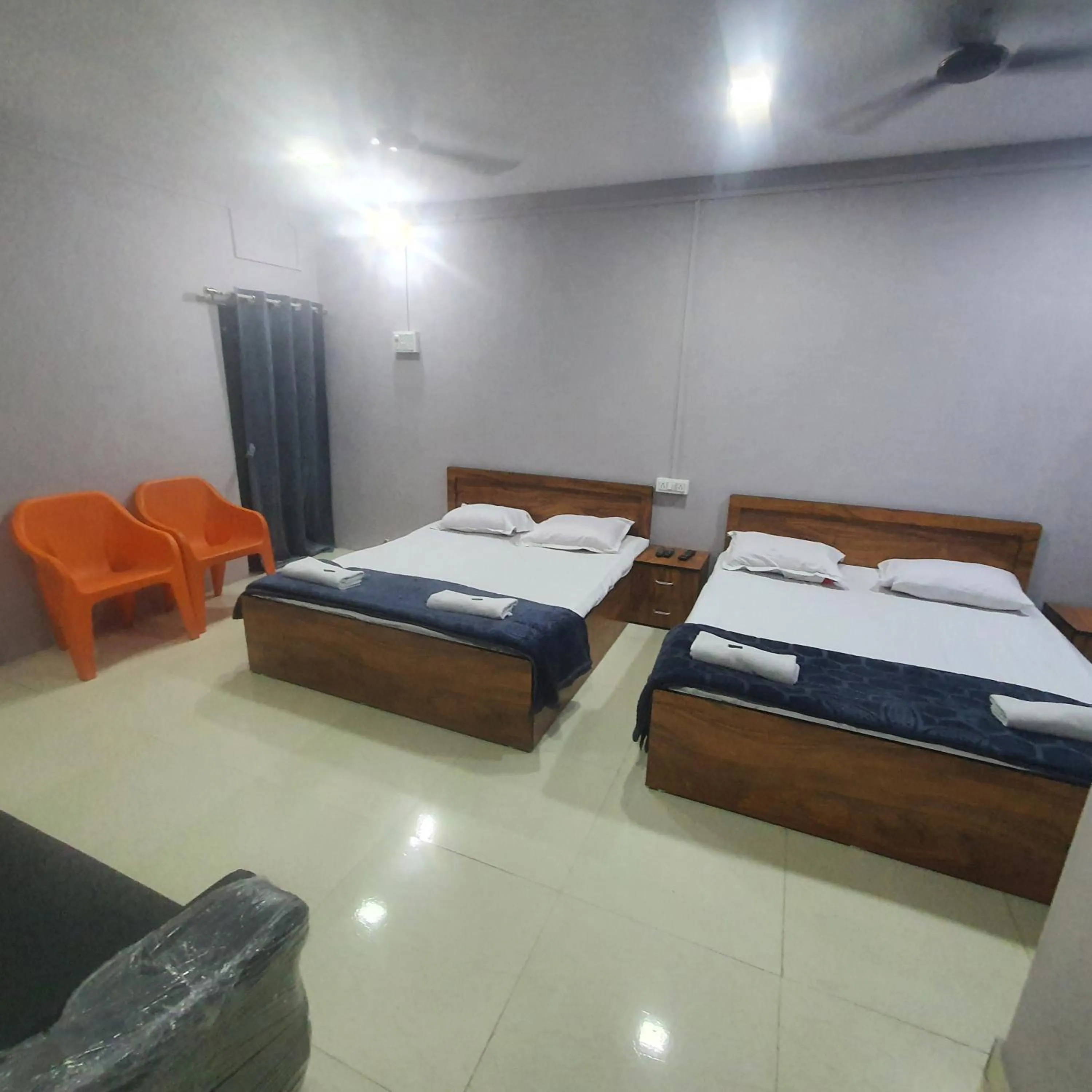 Bed in Hotel Family Stay Beside Railway Station