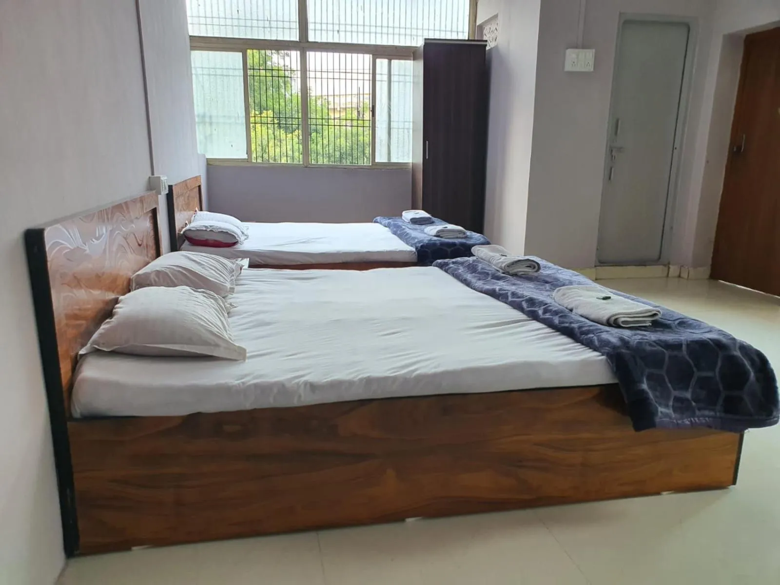 Bed in Hotel Family Stay Beside Railway Station