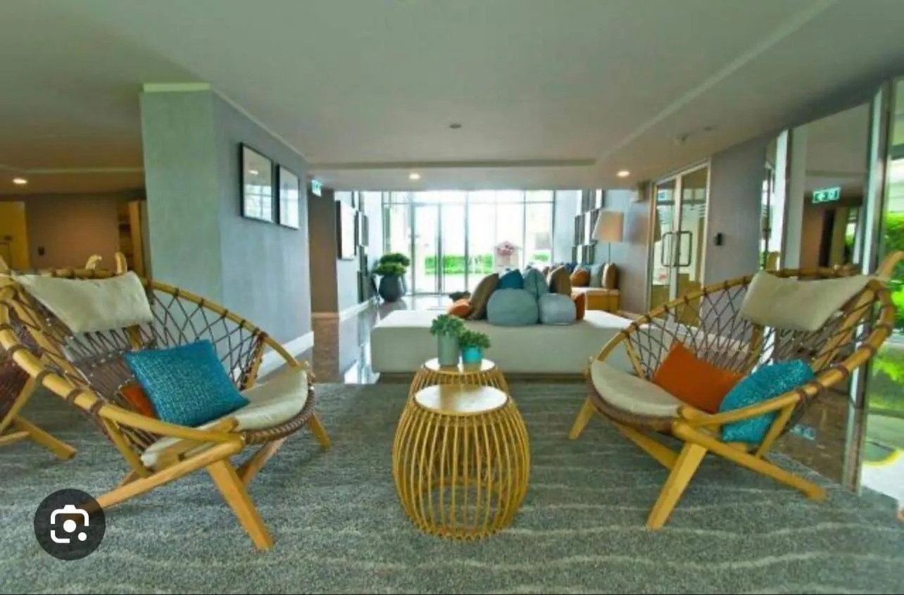 Communal lounge/ TV room in Baan Imm Aim Huahin By Thita