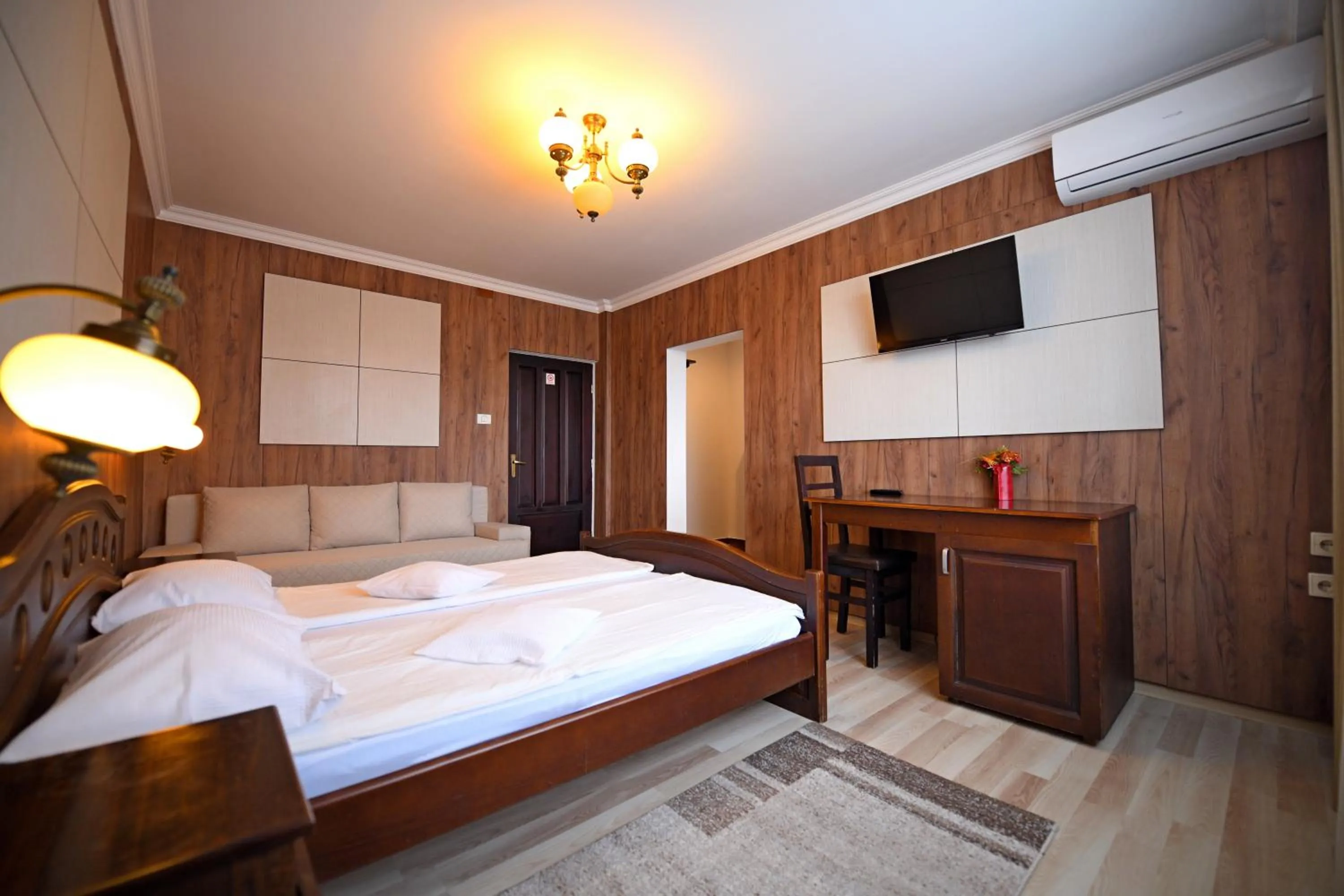 Photo of the whole room, Bed in Pensiunea Sarmis Cristal