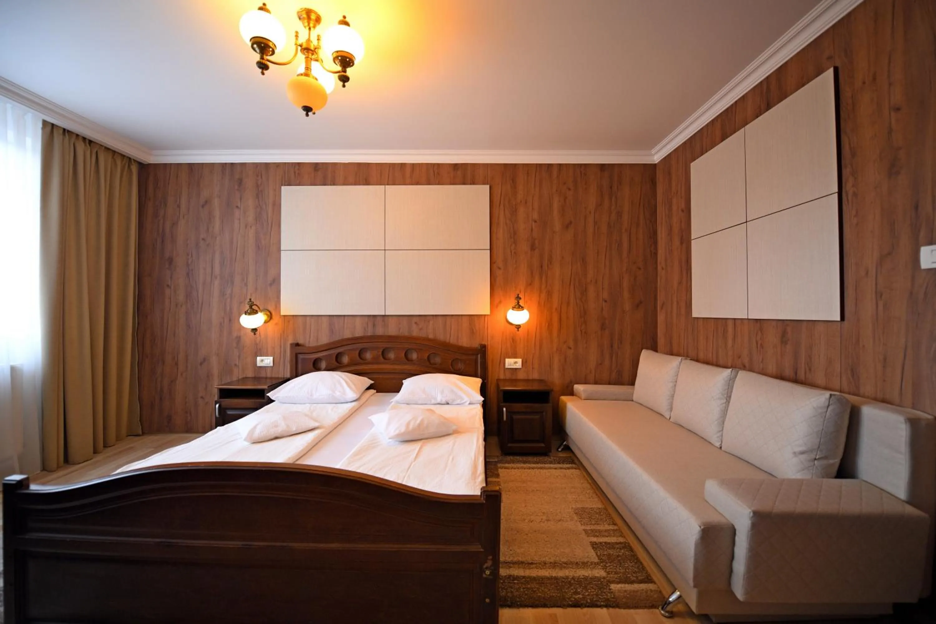 Photo of the whole room, Bed in Pensiunea Sarmis Cristal