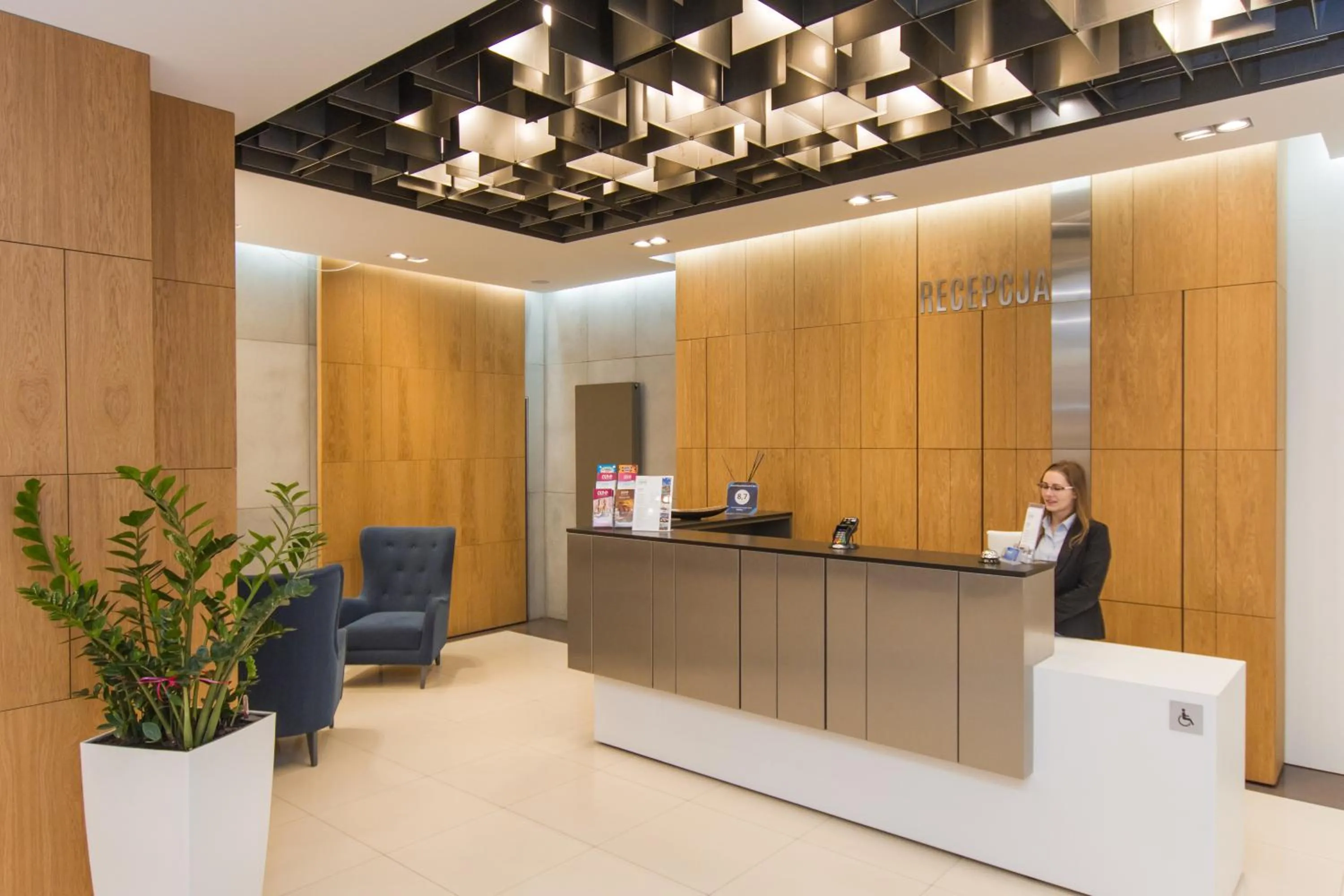 Lobby or reception in Hotel Olimp Business & Spa