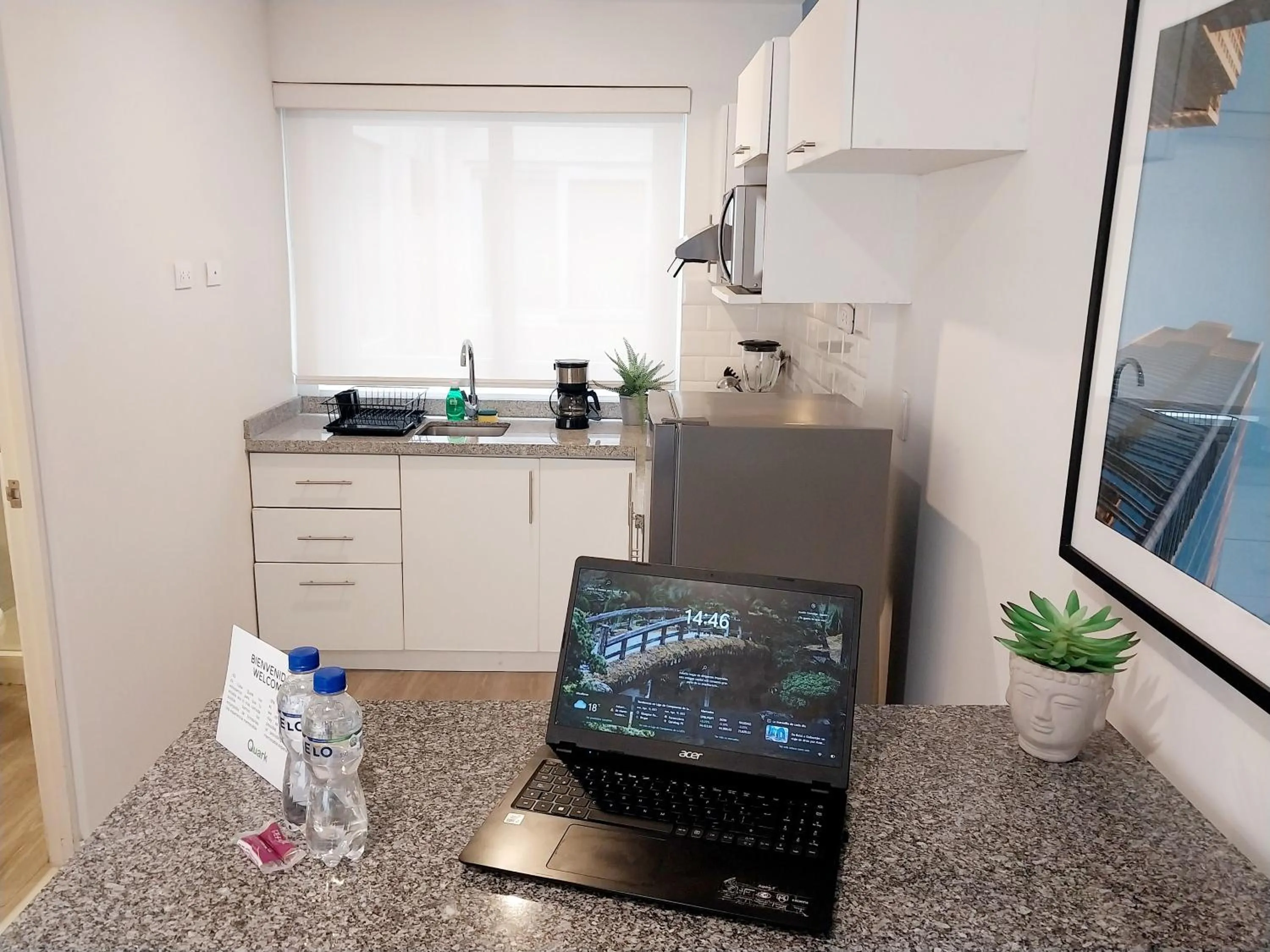 Kitchen or kitchenette in Quark Apartments