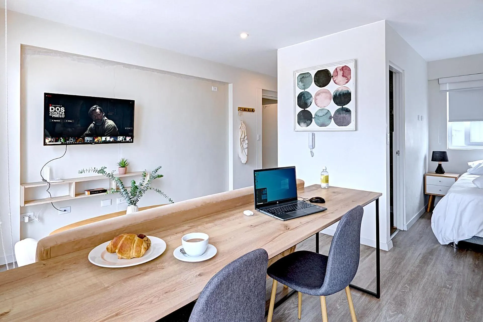 Bed in Quark Apartments