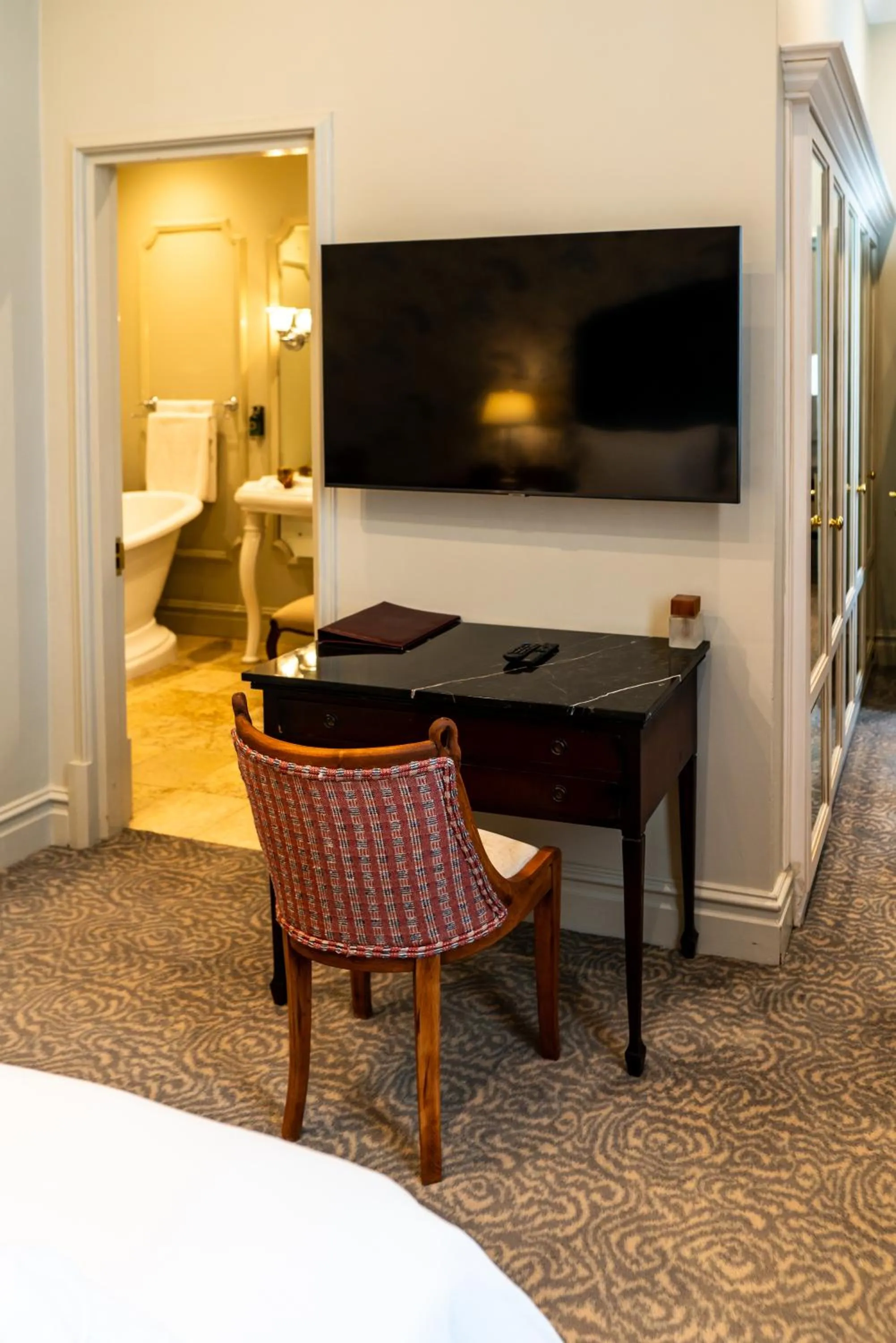 Decorative detail, Bed in The Monarch Hotel