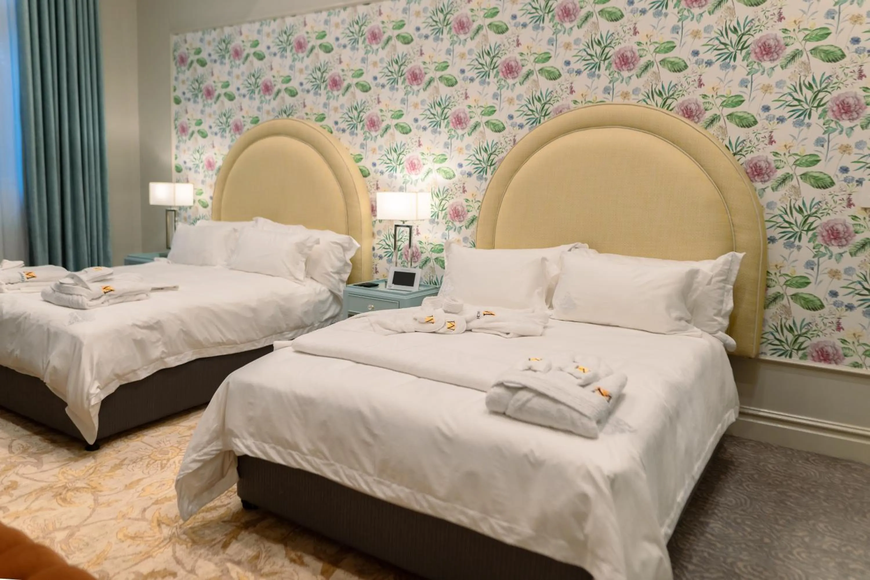 Bed in The Monarch Hotel