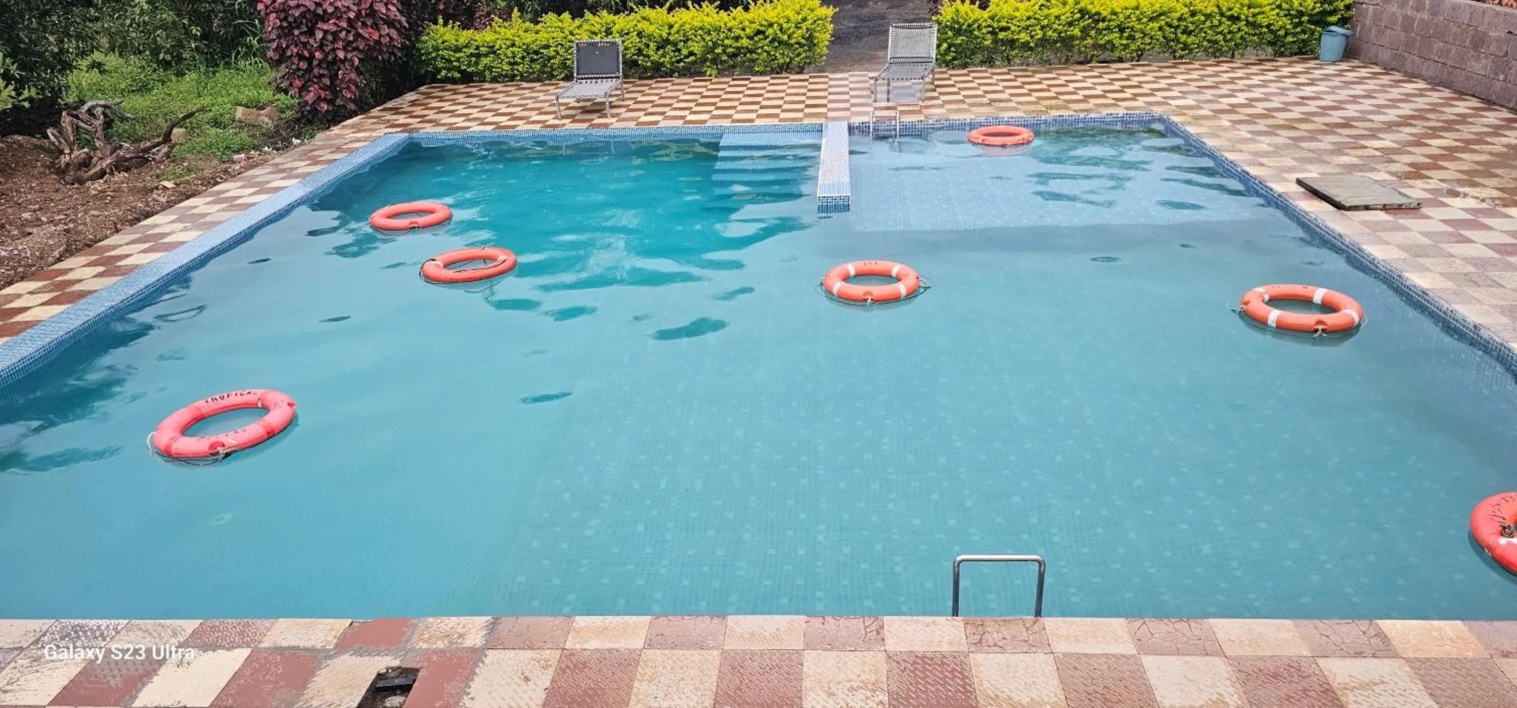 Swimming pool in AamraKunj Gir Resort