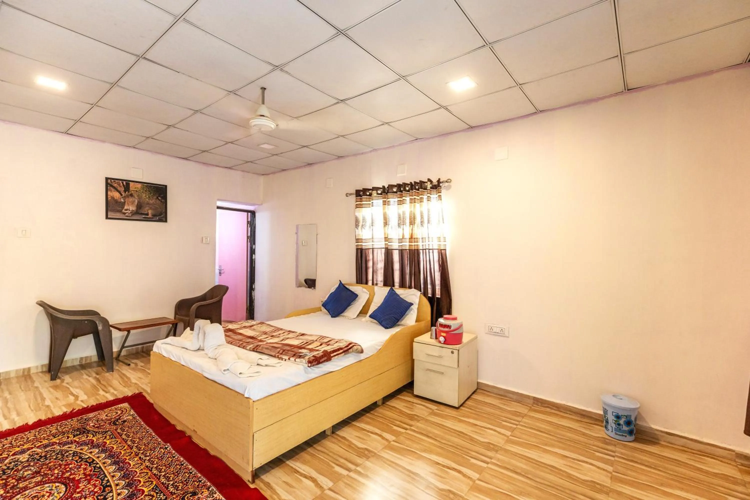Photo of the whole room, Bed in AamraKunj Gir Resort