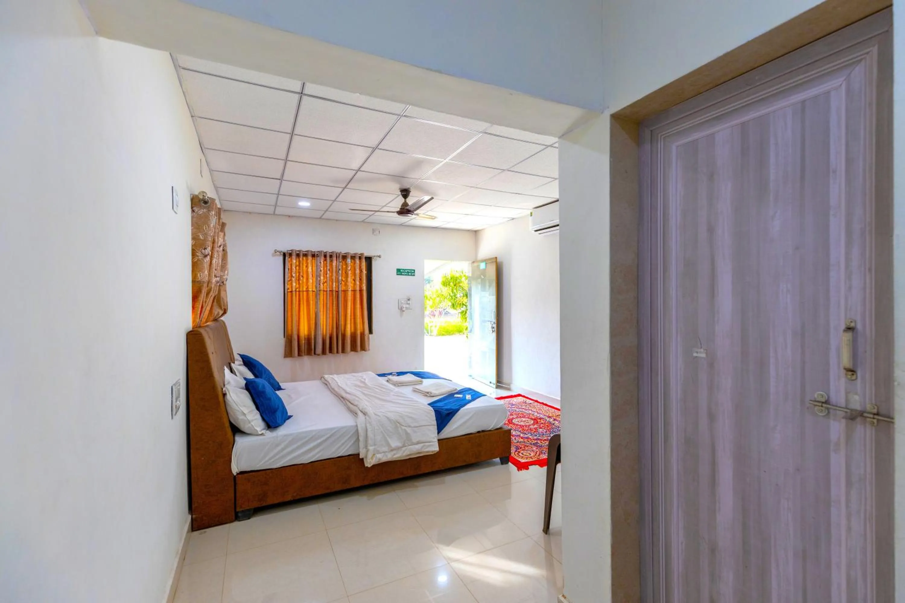 Photo of the whole room, Bed in AamraKunj Gir Resort