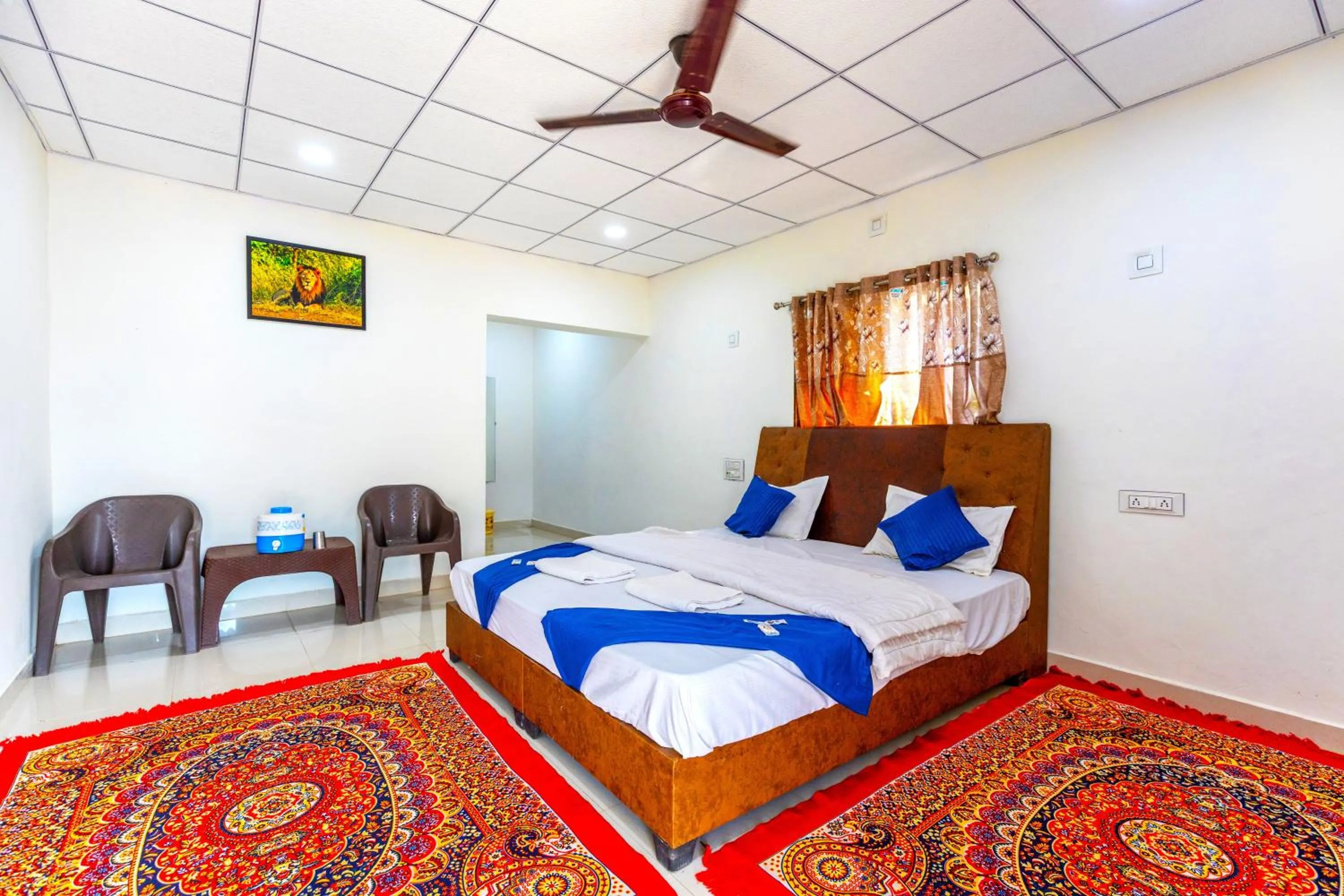 Photo of the whole room, Bed in AamraKunj Gir Resort