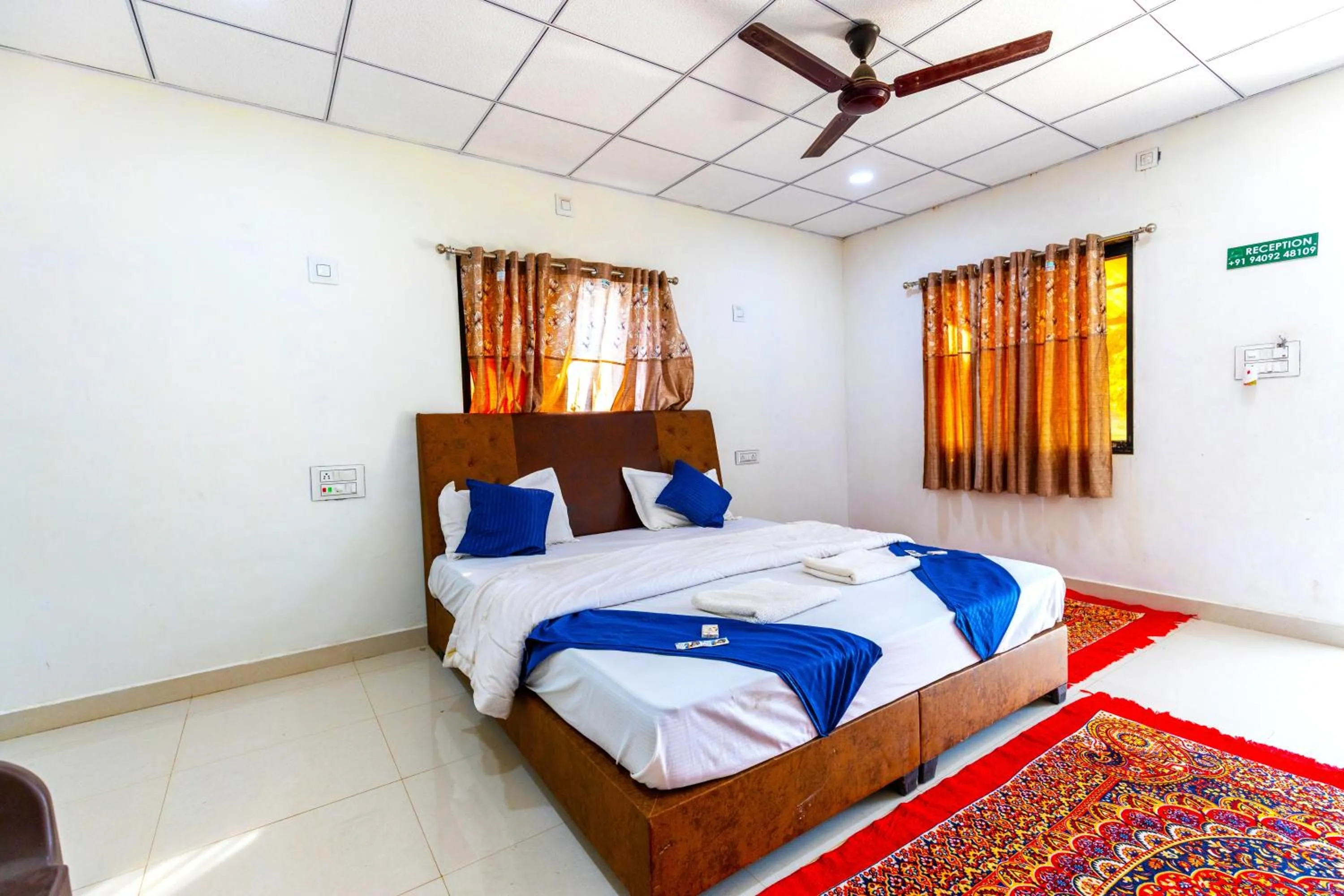 Photo of the whole room, Bed in AamraKunj Gir Resort