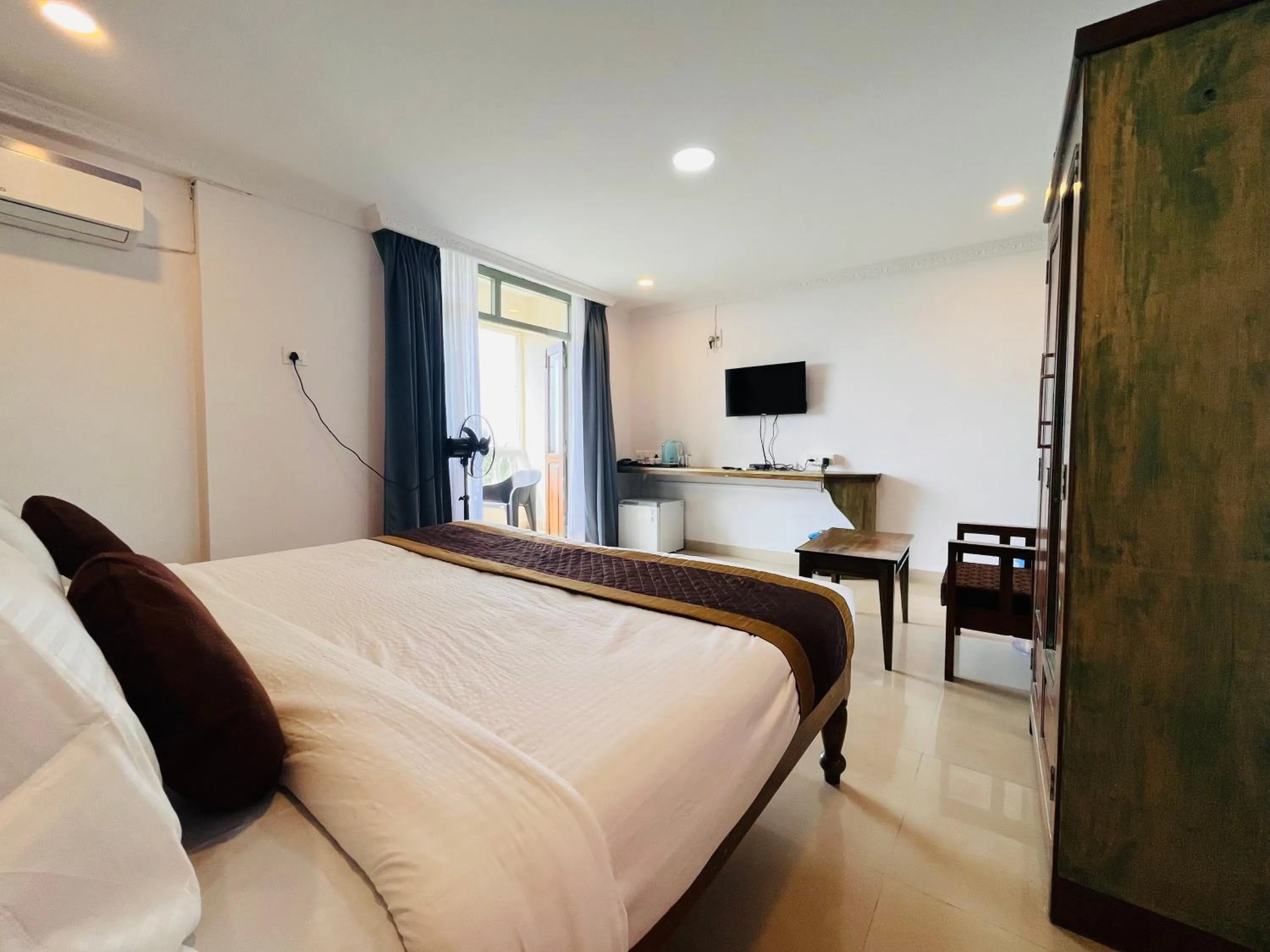 Photo of the whole room, Bed in Nagas Hotel Satyavati Morjim