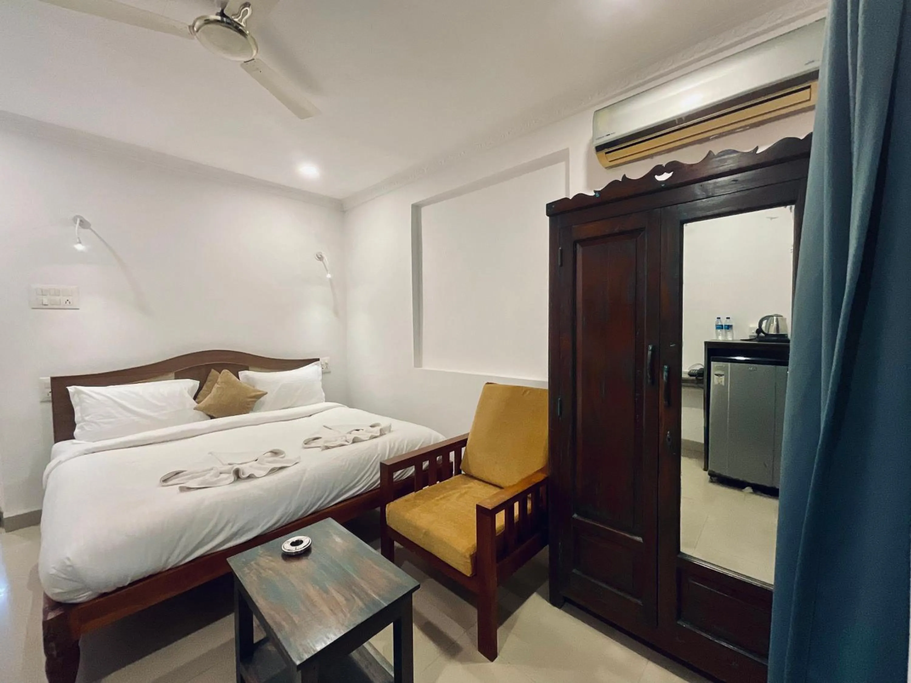 Photo of the whole room, Bed in Nagas Hotel Satyavati Morjim