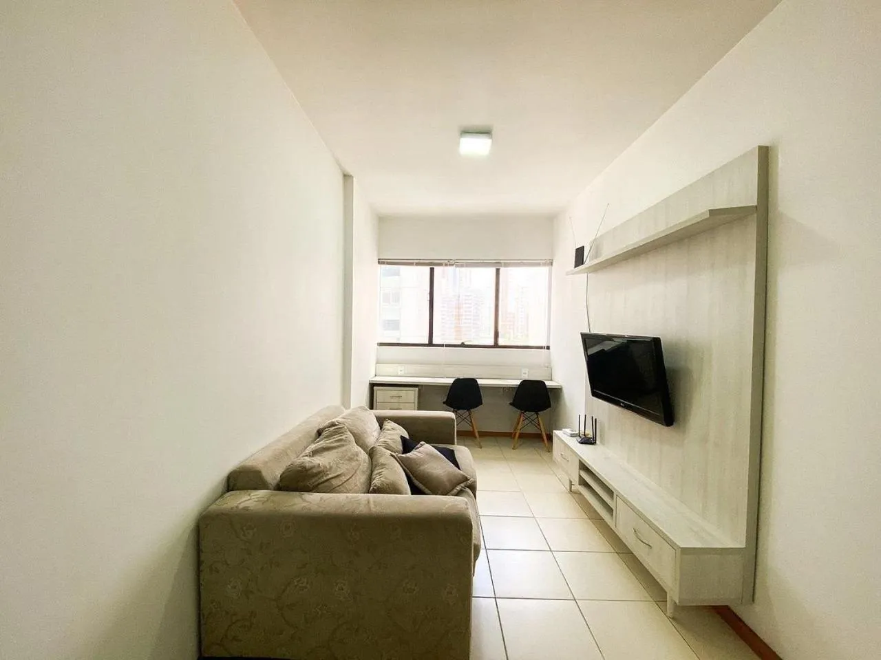 Living room in Ao lado do Metrô e Shopping (1Qto)