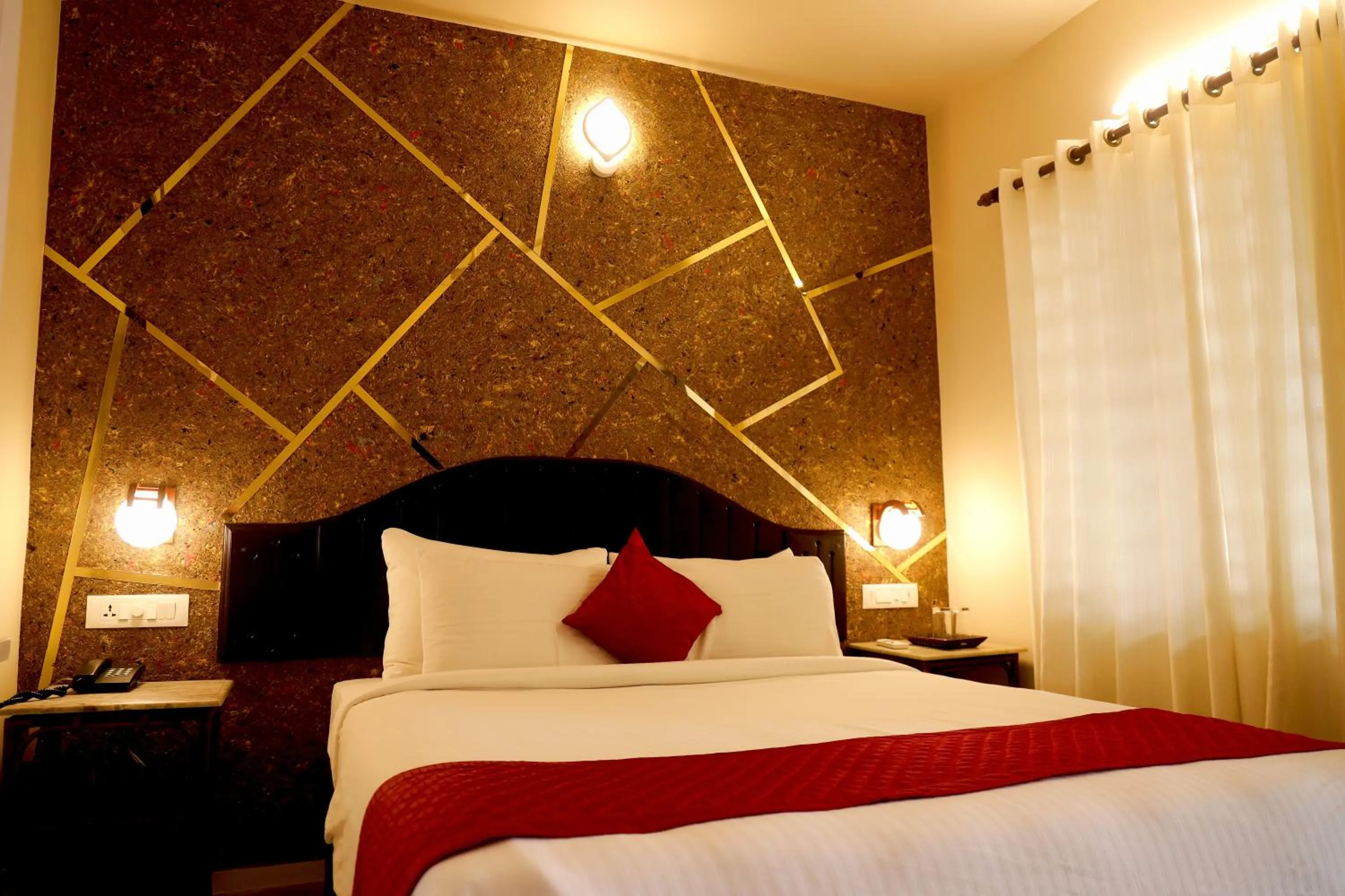 Bed in Lagoona Beach Resort, Kovalam