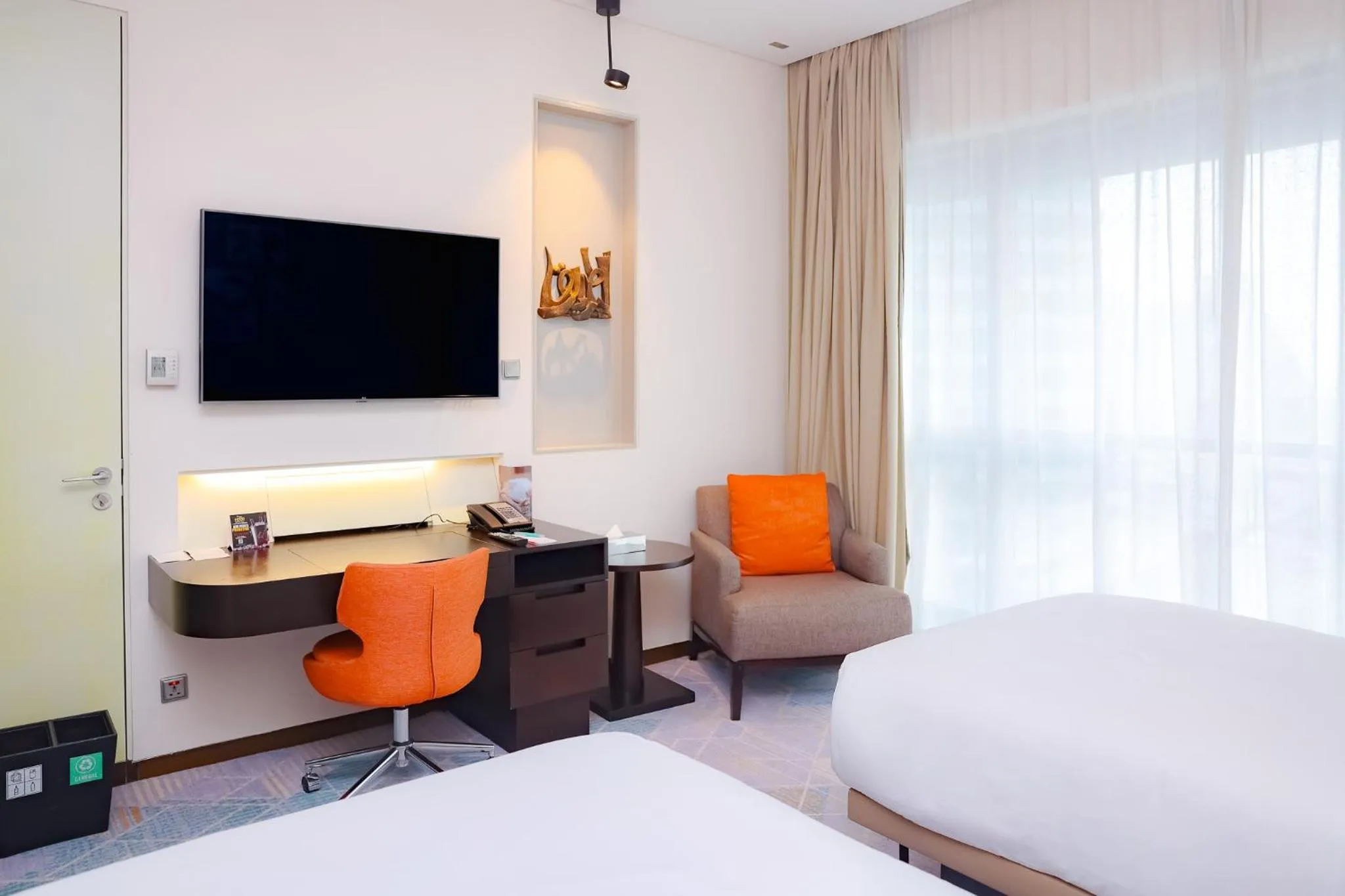 Seating area, Bed in Le Meridien City Centre Bahrain