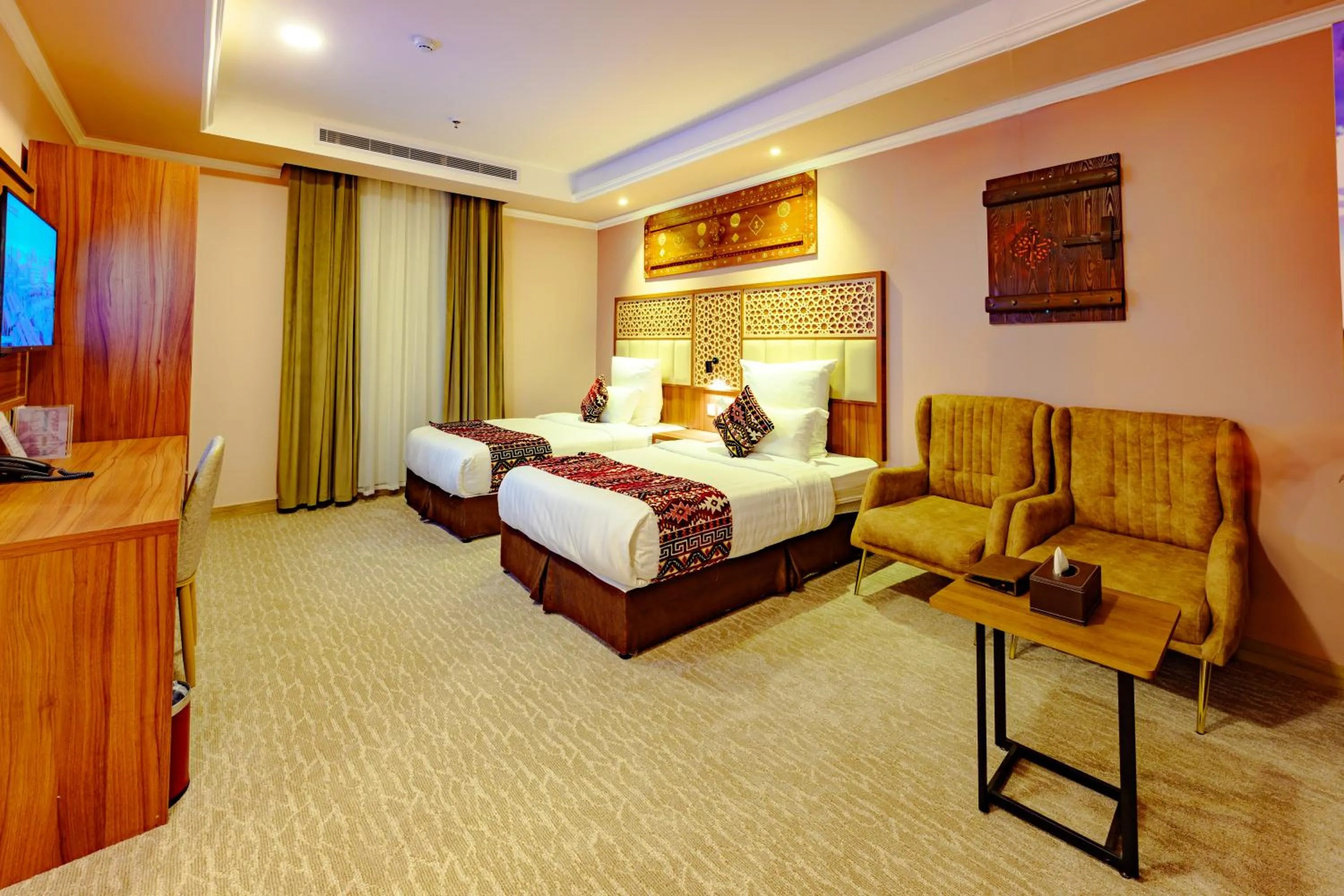 Twin Room in Zaman Homeland Hotel