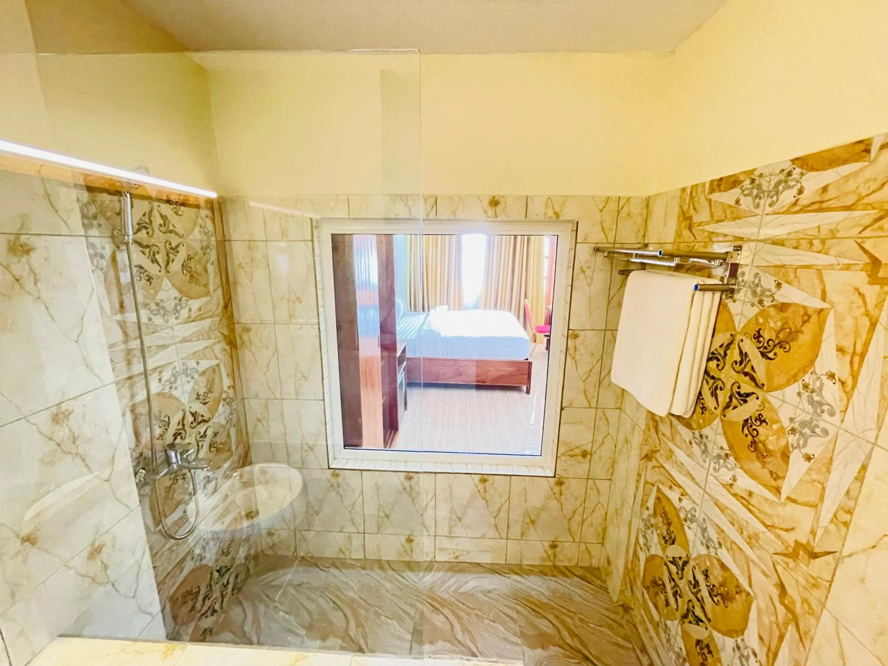 Bathroom in Pulickal Heights Hotel