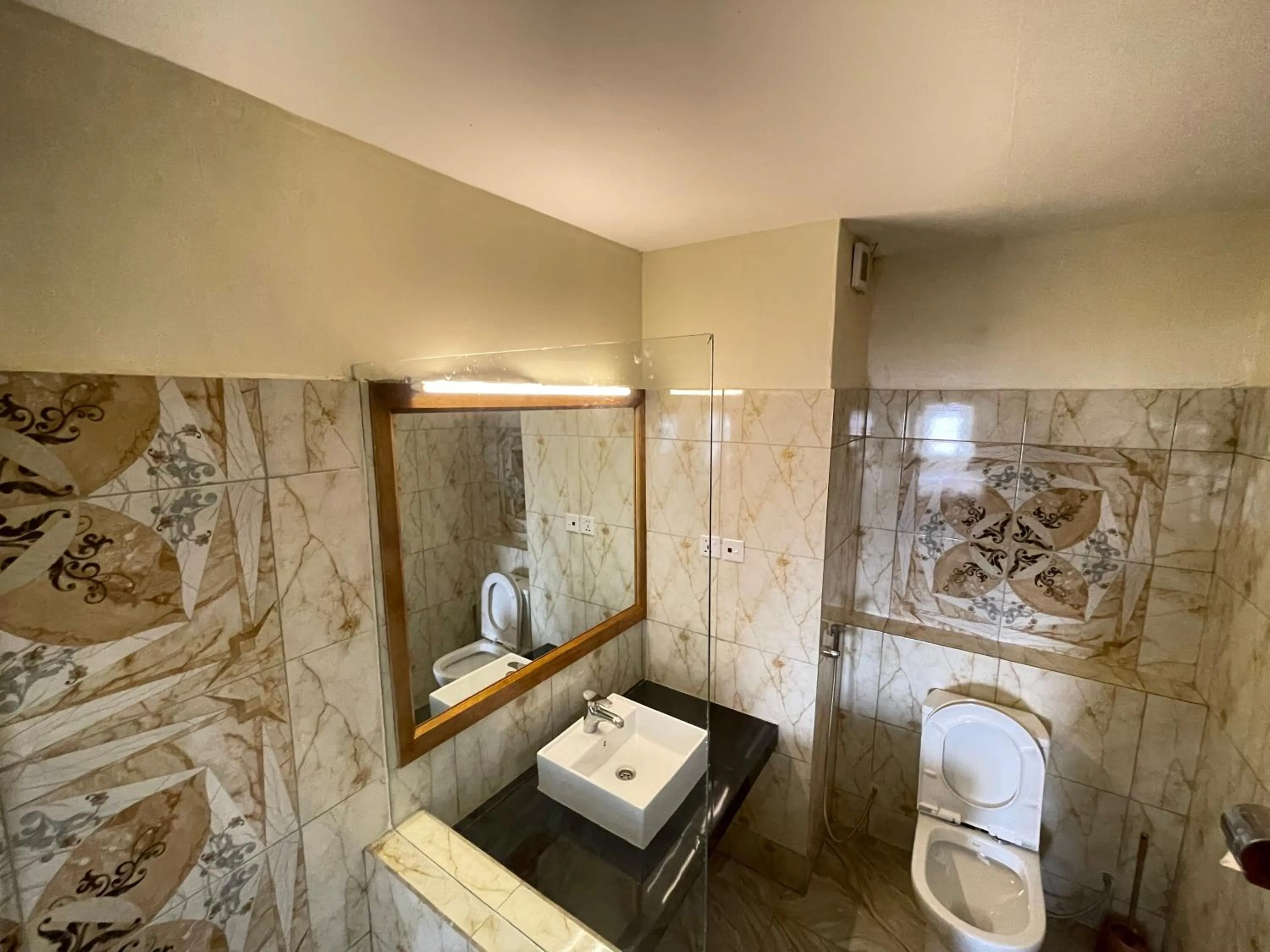 Toilet in Pulickal Heights Hotel