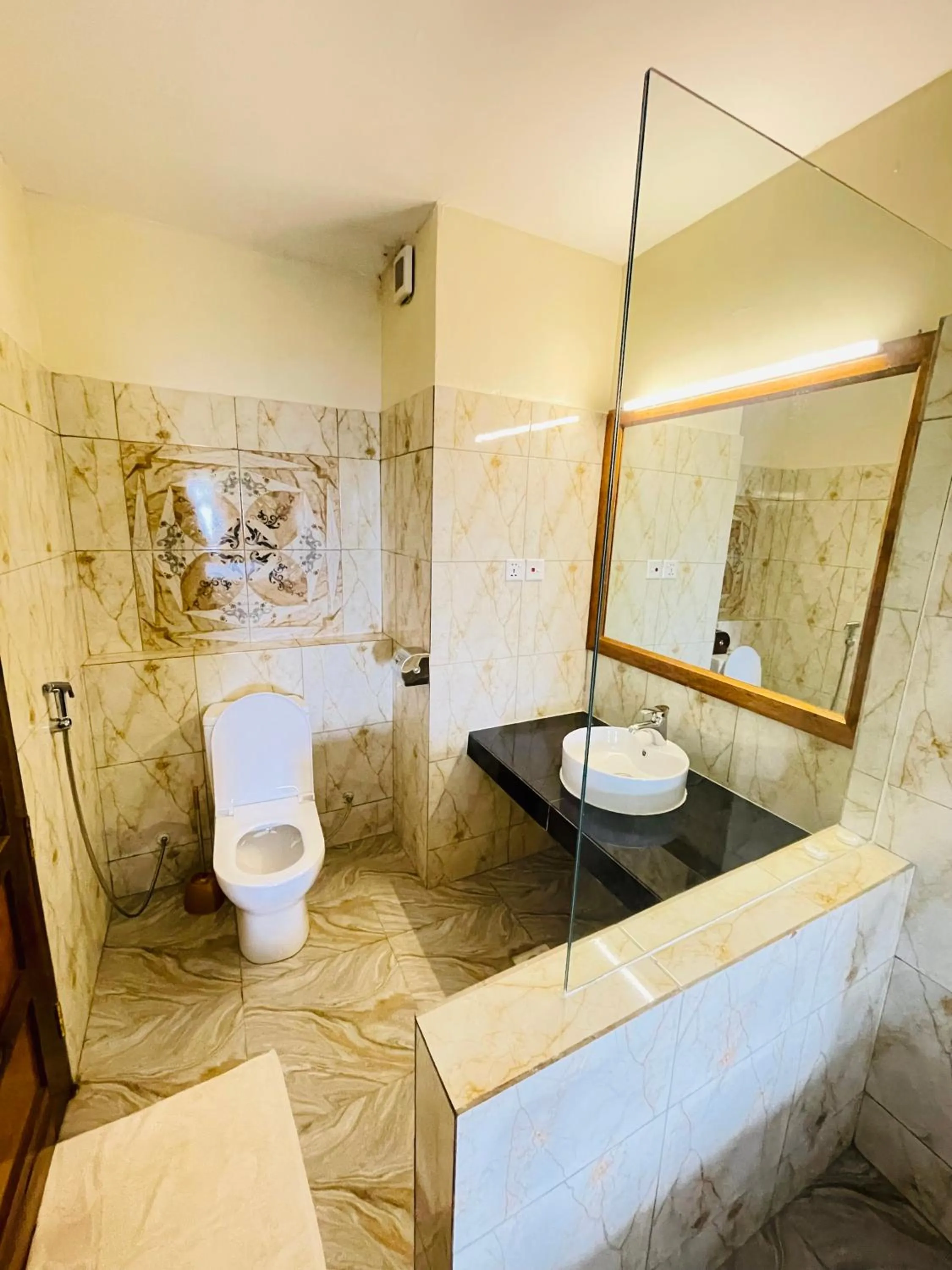 Toilet in Pulickal Heights Hotel