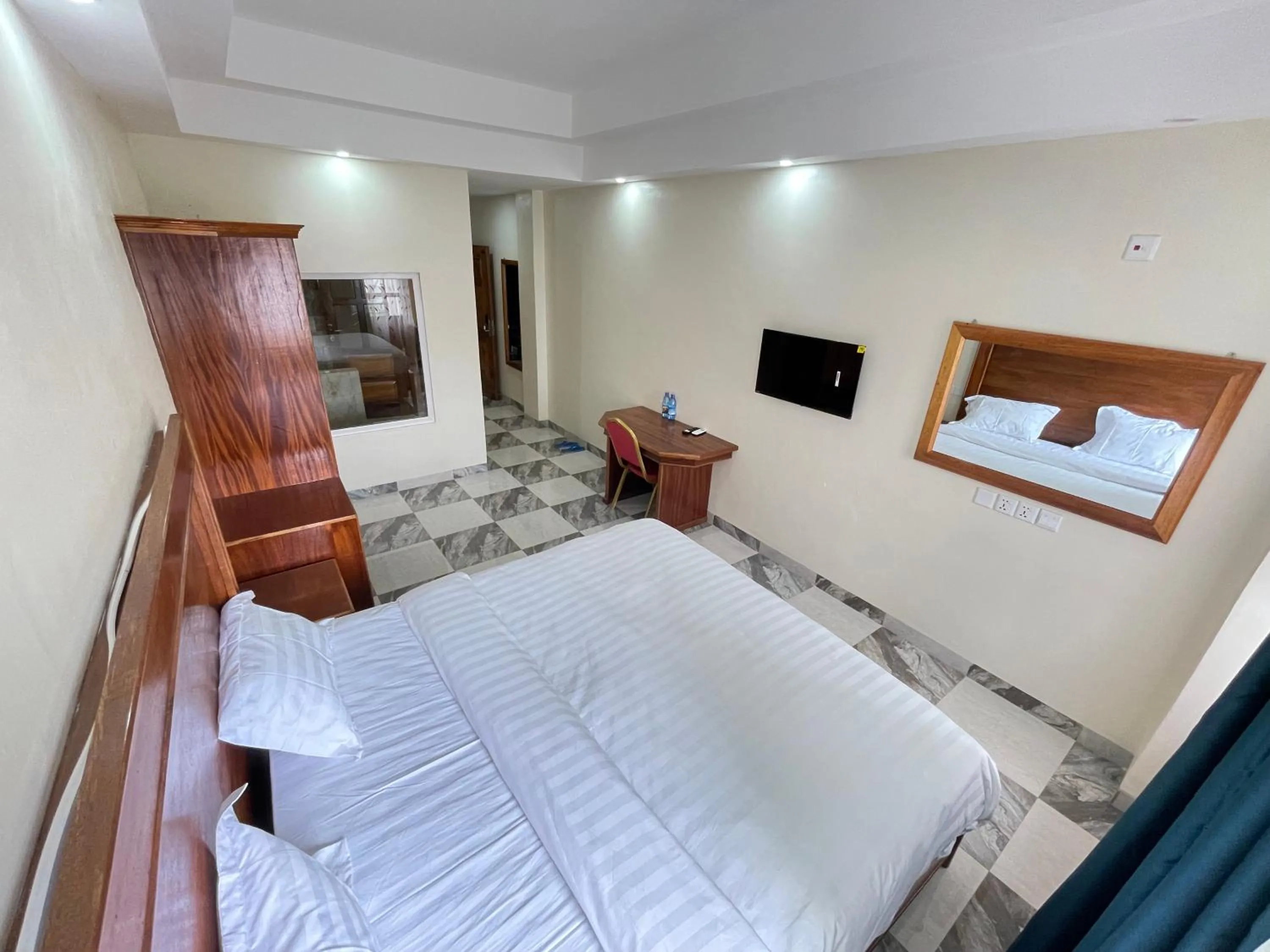 Photo of the whole room in Pulickal Heights Hotel