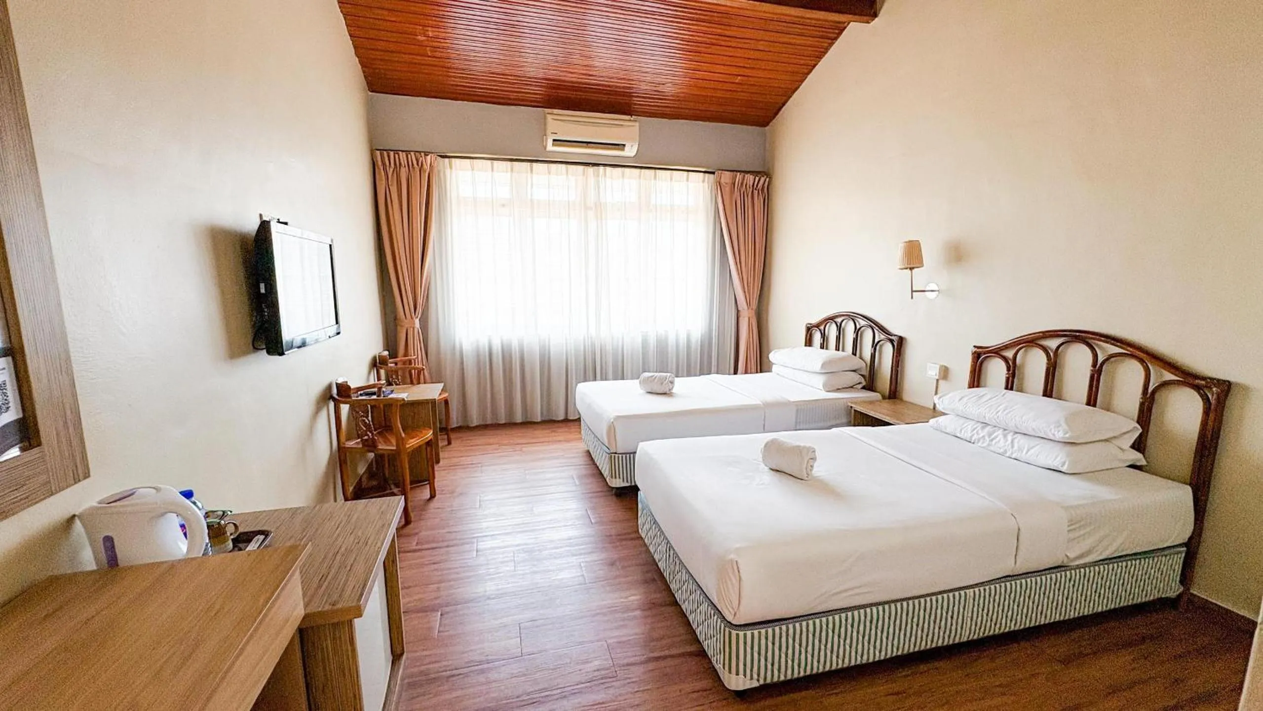 Bed in Lovita Tanjung Bidara Beach Resort