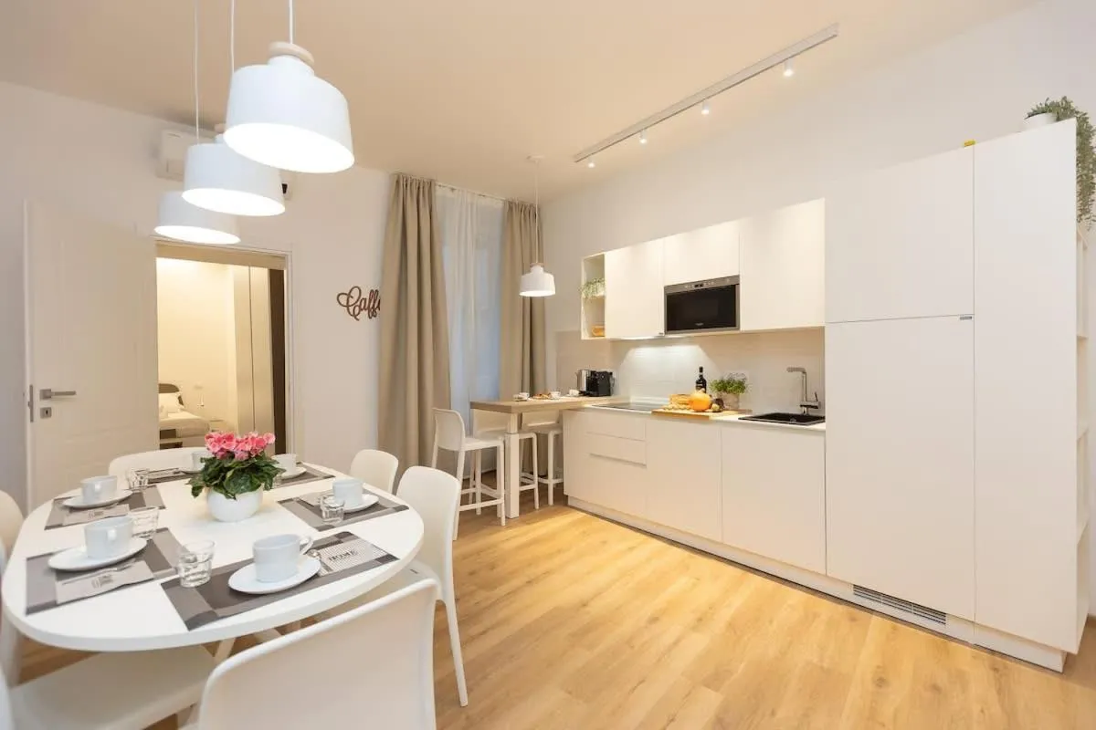 Kitchen or kitchenette in Colosseum Holidays - Three-Bedroom Apartment