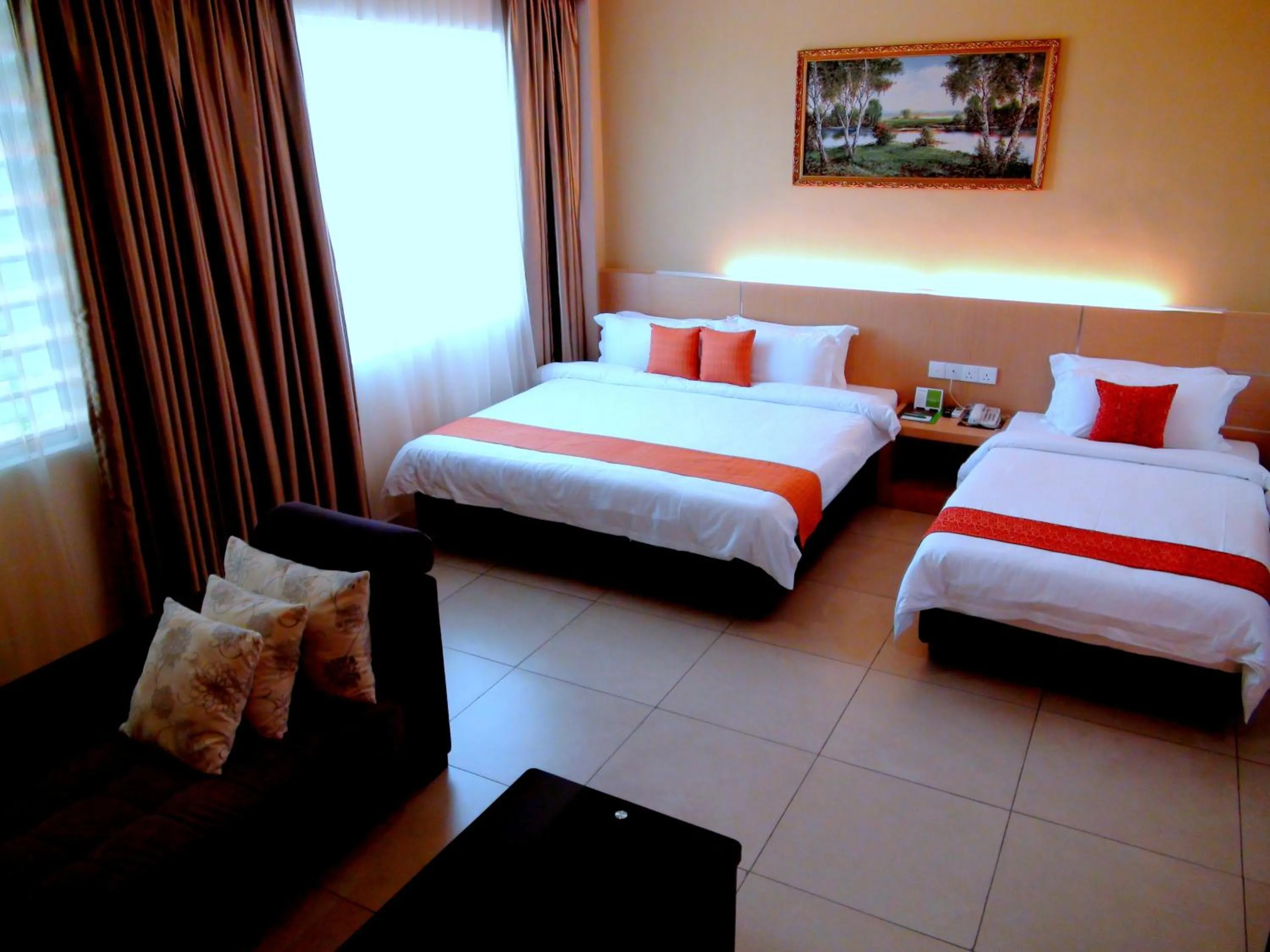 Bed in Paragon Lutong Hotel